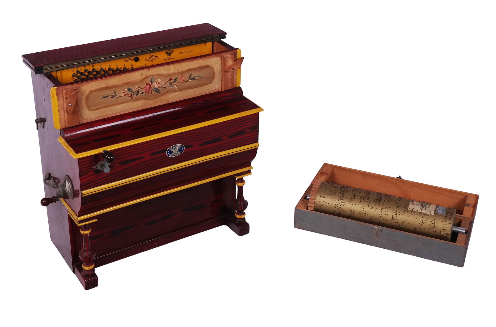 Vincente Llinares Faventia Barrel Piano: Vintage crank/street barrel piano, circa 1950s; the maker is Vincente Llinares Faventia, from Barcelona, Spain; including an additional pinned cylinder in a custom case. The instrument is painted red