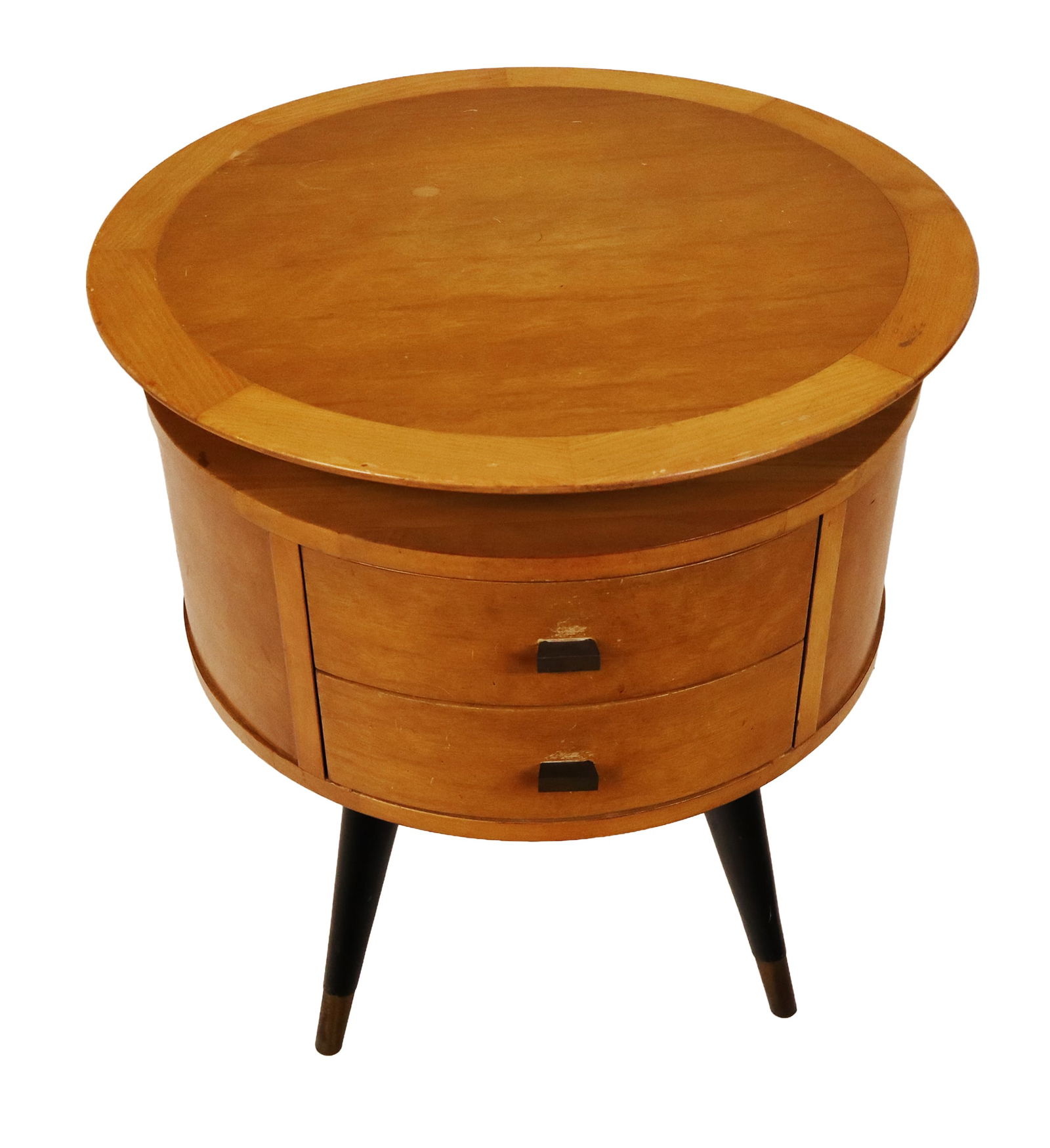 Warsaw Furniture Circular Maple End Table: Warsaw furniture circular end table, mid-20th century, with a tiered top, two drawers, and black legs, marked Warsaw to underside. [22" H x 23" Diameter]. Condition is good with minor wear. From the