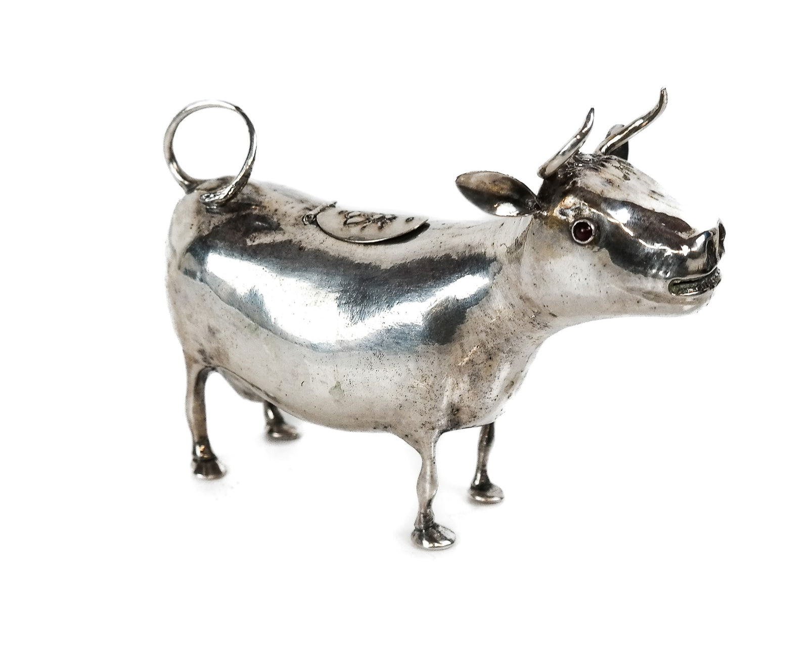 Continental Silver .800 Quality Cow Creamer: Continental silver .800 quality cow creamer, amusingly mounted with fly on back, mark to top. [5 ozt., 4" H x 5" L x 1.75" D]. Overall condition is good.