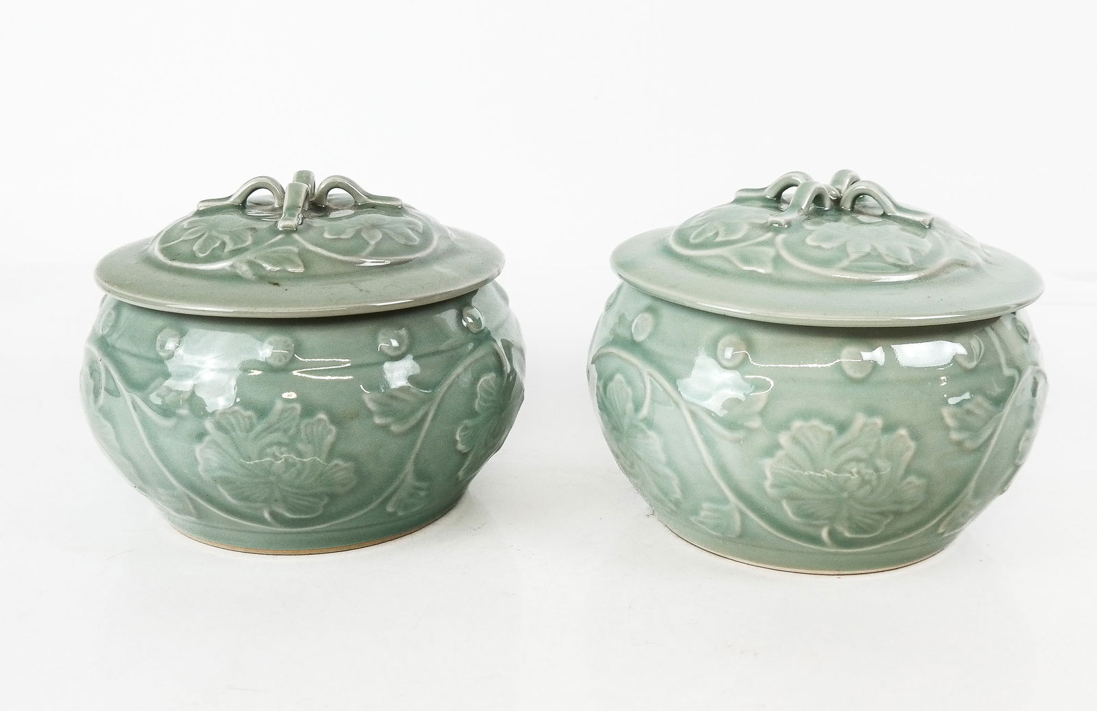 Pair of Chinese Pressed Celadon Covered Jars (1 of 13)
