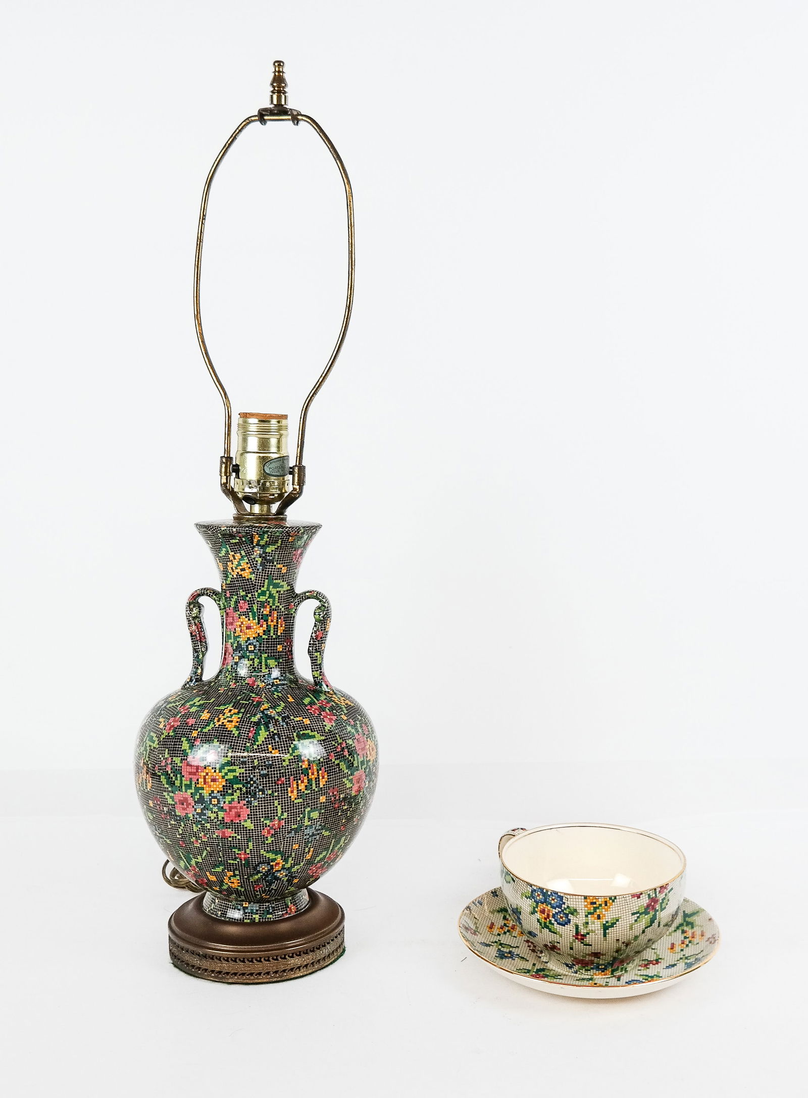 Royal Winton Chintz Ware Lamp & Cup with Saucer: Royal Winton chintz ware porcelain "Queen Anne" pattern coffee cup and saucer, marks to base; together with a similar ewer form vase mounted as a lamp on metal base, unmarked but attributed to Royal