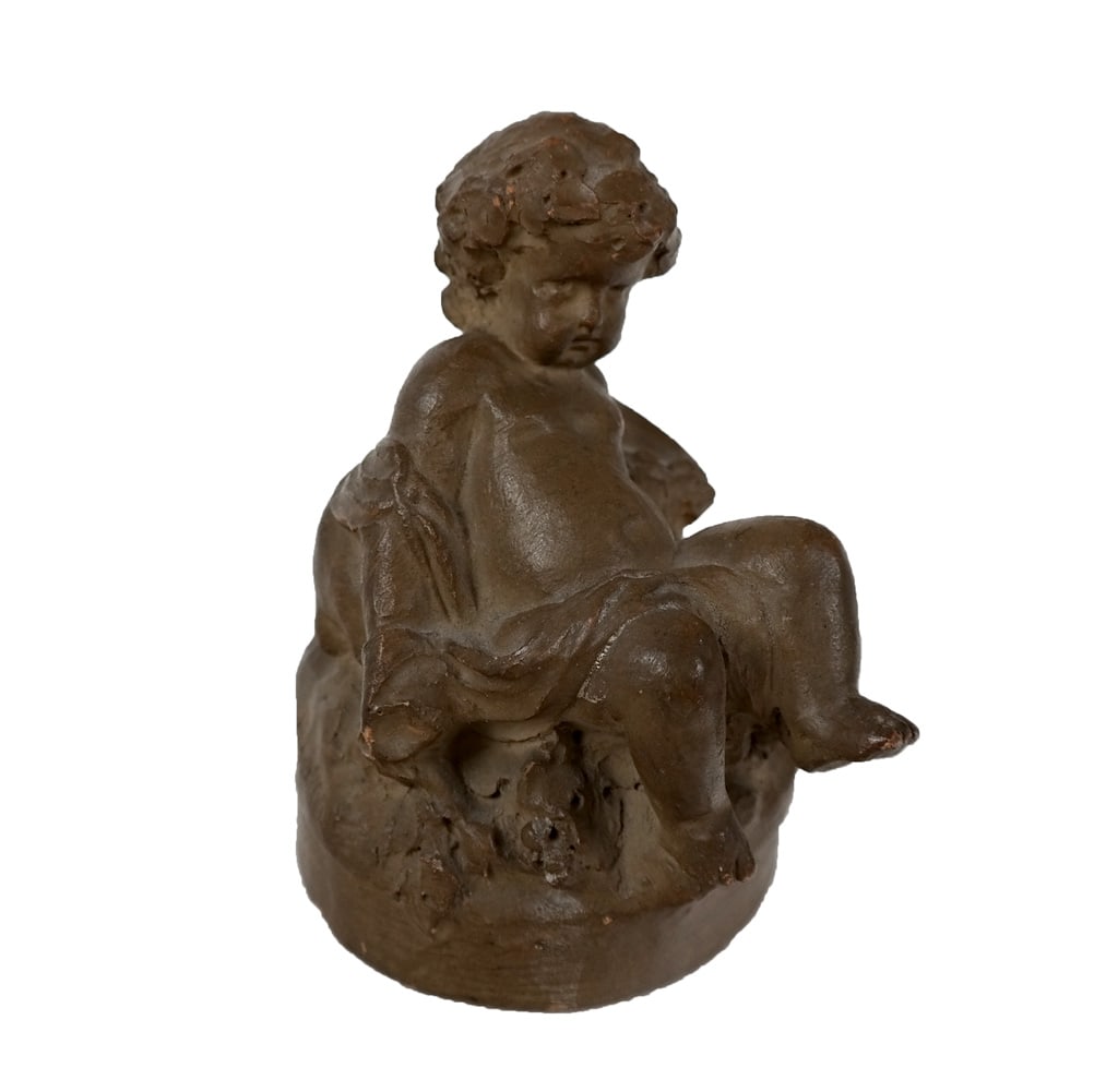 Clodion, Terra Cotta of the Infant Bacchus: Claude Michel or Clodion (French, 1738-1814) terra cotta of the infant Bacchus, signed at lower, similar to an unsigned piece at the Metropolitan Museum of Art. [4.5" H x 3.5" W x 4" D]. Condition is