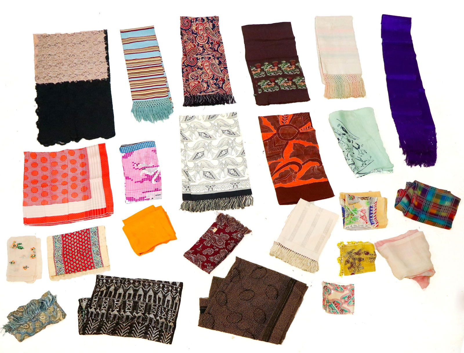 Assorted Vintage Silk and Other Scarves, 26: Assorted vintage scarves comprising six silk chiffon scarves, eight silk scarves, a cotton Batik scarf, eight synthetic scarves, a machine lace scarf, and two lace scarves with metal details. Conditio