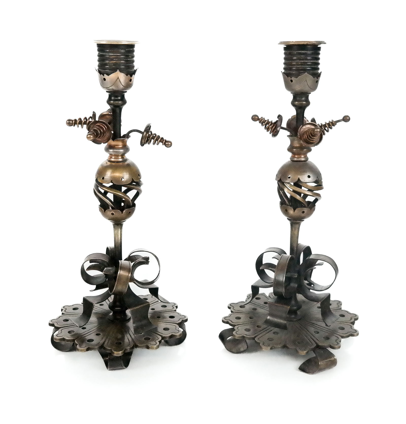Pair of Brass Found Object Candlesticks: Pair of brass found object candlesticks, 20th century, with decorative spring and hardware elements. [9.5" H x 5" Diameter]. Condition is good with repairs to one. From the Collection of Sue and