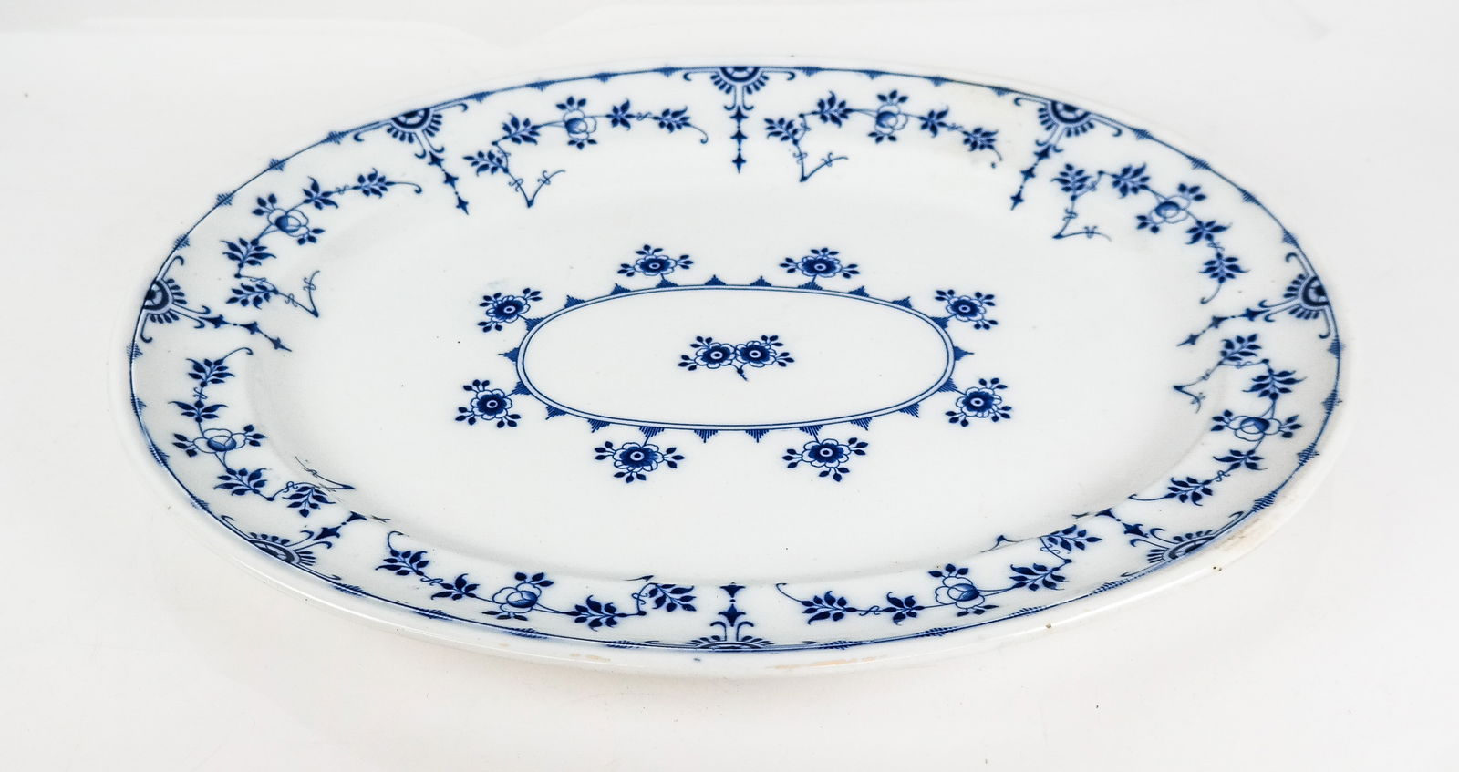 Minton "Danish" Blue and White Platter: Minton "Danish" pattern blue and white hand-painted serving platter, with 1863-72 stamp to reverse. [21" W x 17" D]. Condition is good. From the Collection of Sonia and Philip Reine of Long Island.