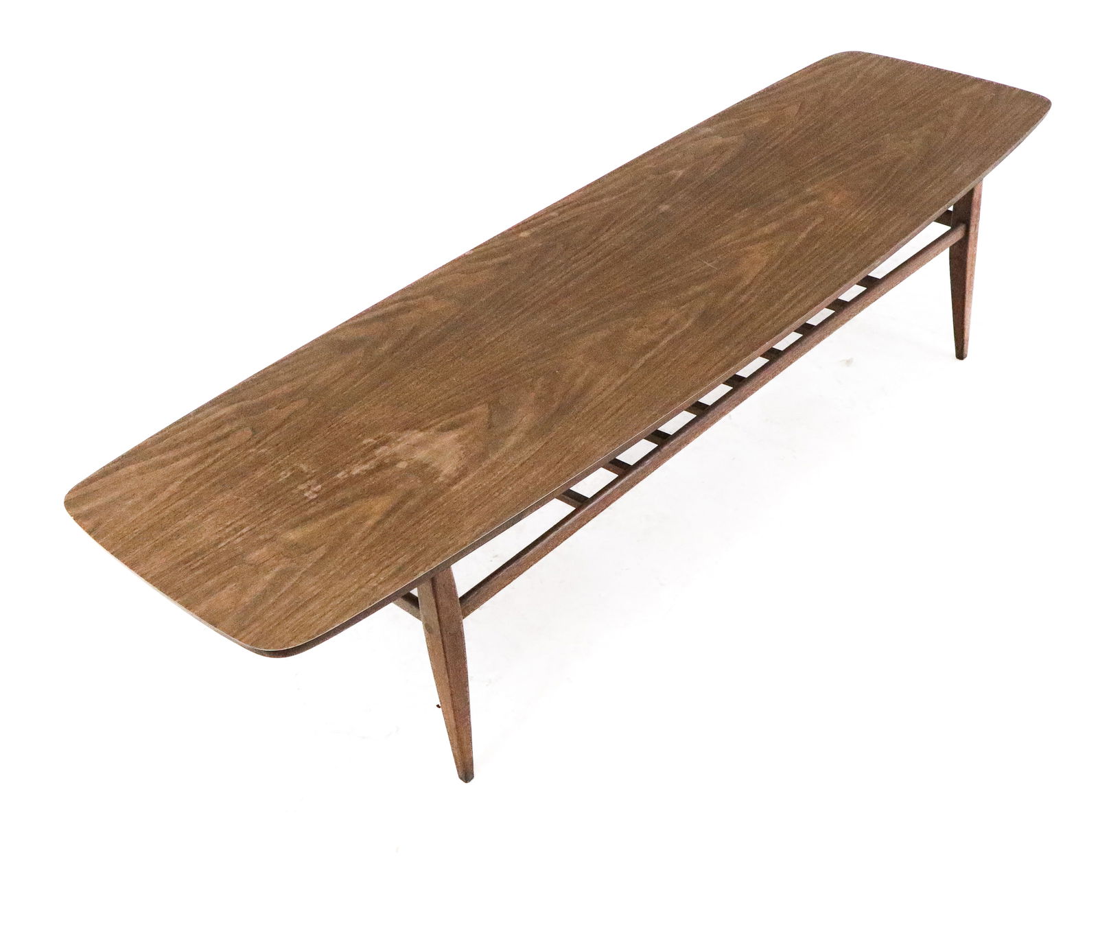 Lane Modern Cocktail Table: Lane Modern Cocktail table, in elliptical shape, over a slatted lower tier and straight legs. Mid 20 century.14"H x 60"W x 18"D]. Overall good condition.