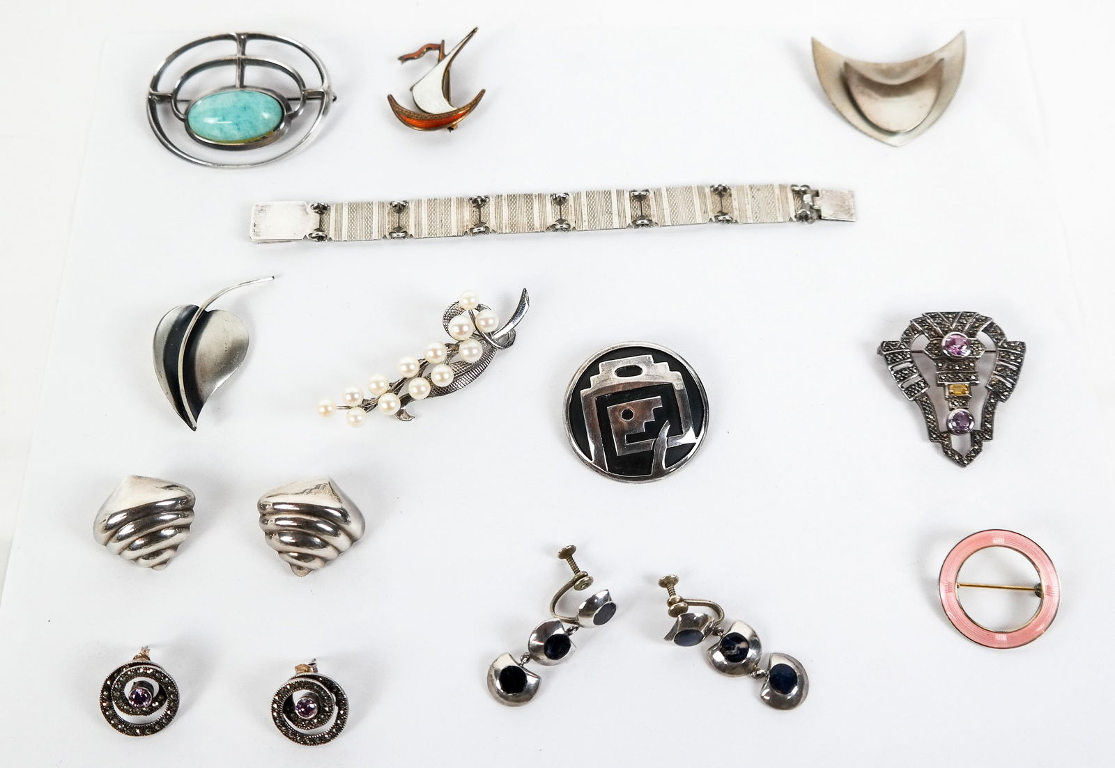 David Anderson Et Al Silver Jewelry, 15: Group of assorted silver items comprising a David Anderson amazonite brooch, 2 Jewelry Art brooches, cultured pearl brooch, 2 Norwegian enamel pins, Mexican silver brooch and 2 earrings, bracelet,