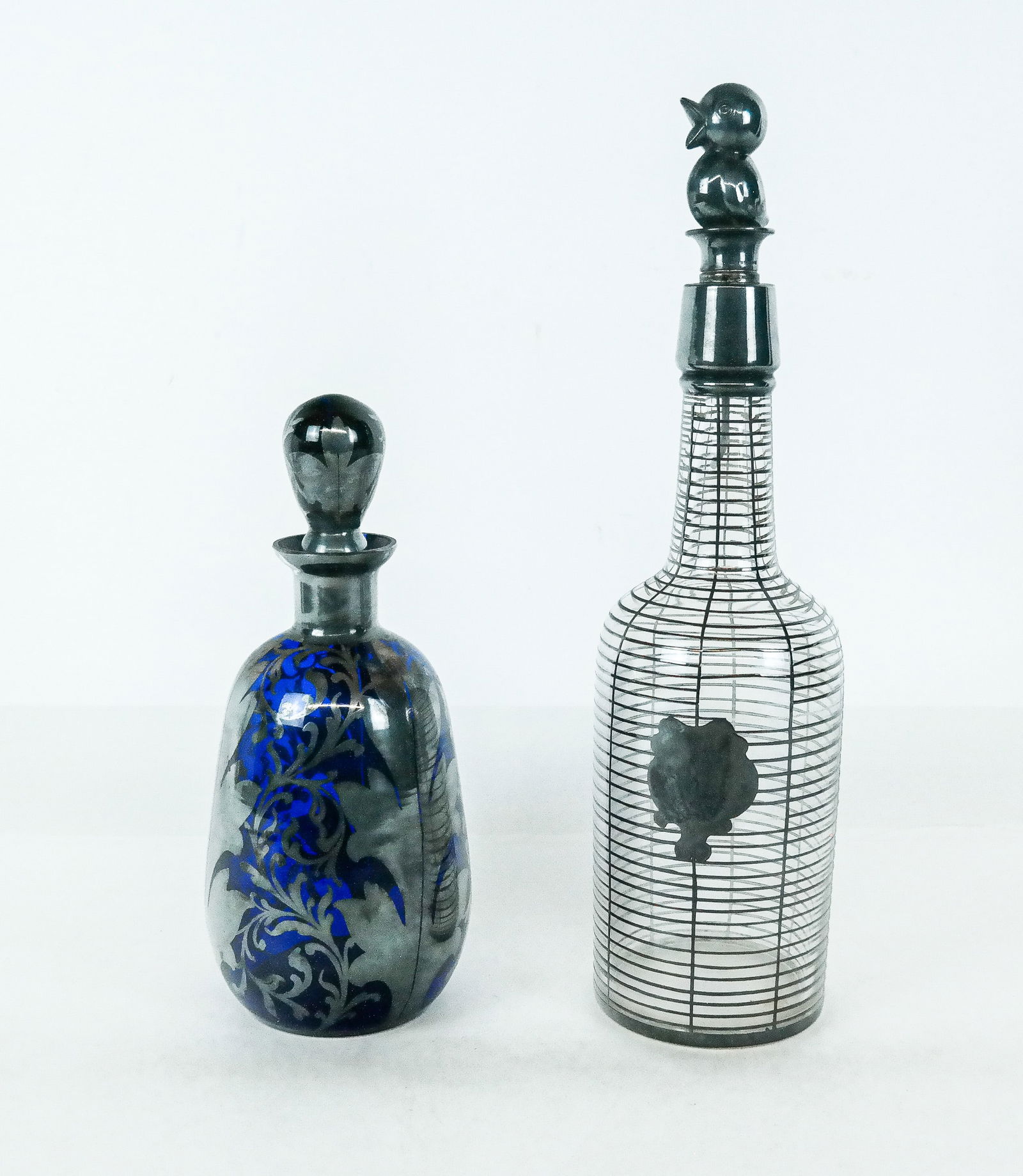 Two Silver Overlay Decanters - 12