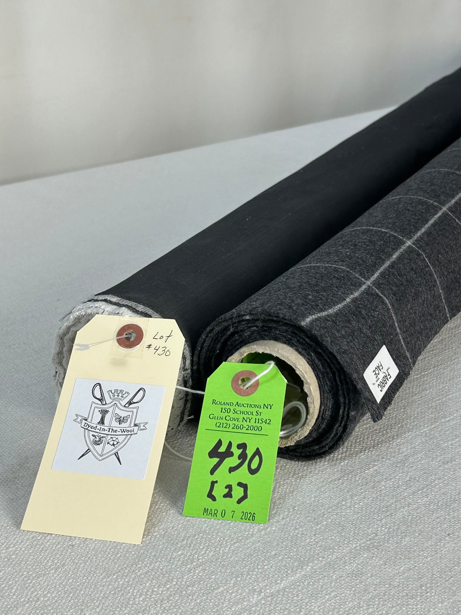 Holland & Sherry Check And Euro Grey Silk Fabric: 1) 4 1/2 yards of Holland & Sherry's worsted wool large check in off-white on anthracite, 56" width. Has a design repeat of 3" vertical by 3 1/4" horizontal. Reversible, multi-purpose, and in excellen