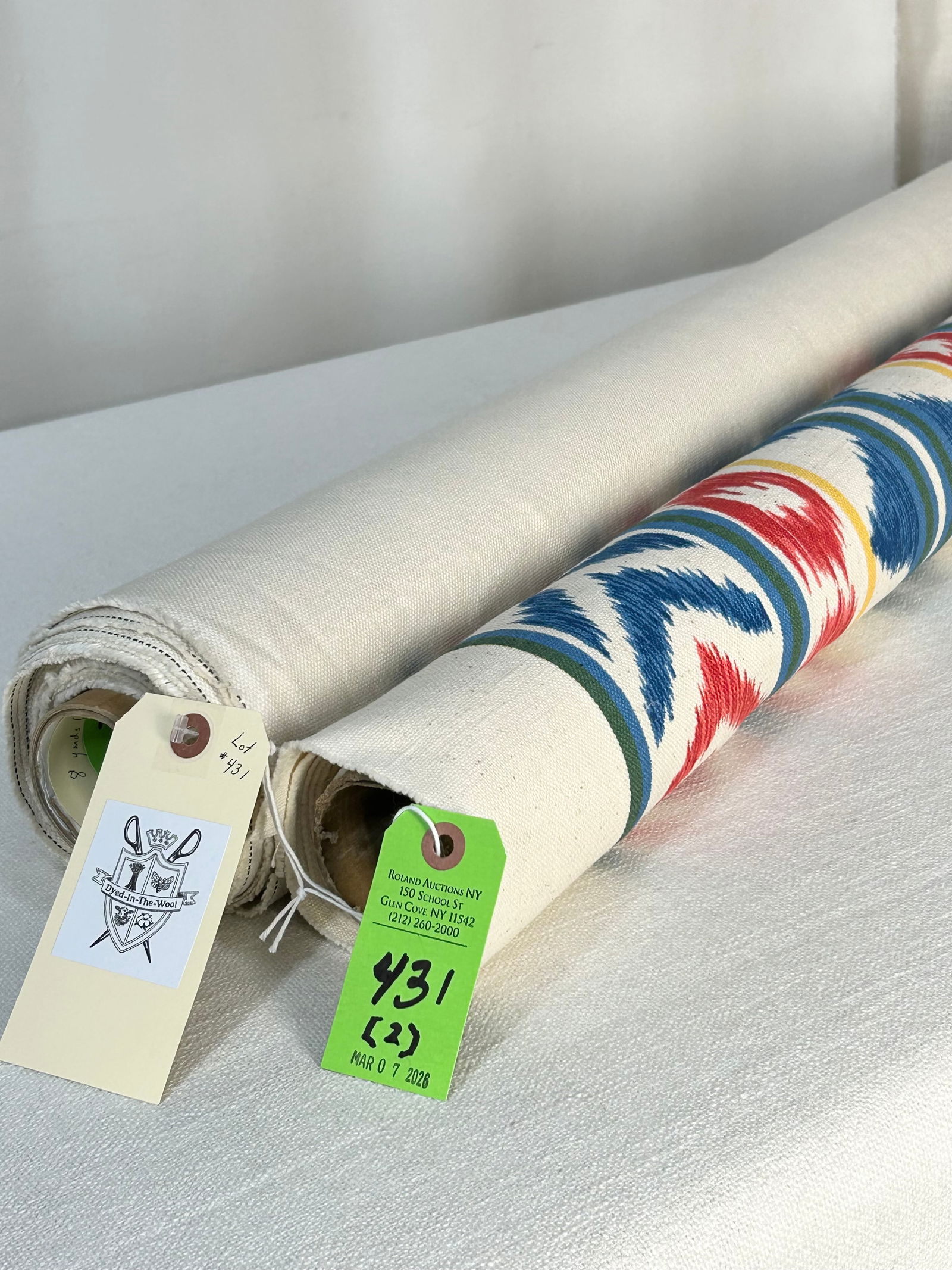 Printed Ikat Stripe And C & C Milano Linen Fabric: 1) 2 3/4 yards of a hand-printed Indian cotton in a faux Ikat-style stripe, in colors of blues, reds, green and gold on an off-white ground, 47" width. The multi-purpose quality has a design repeat of