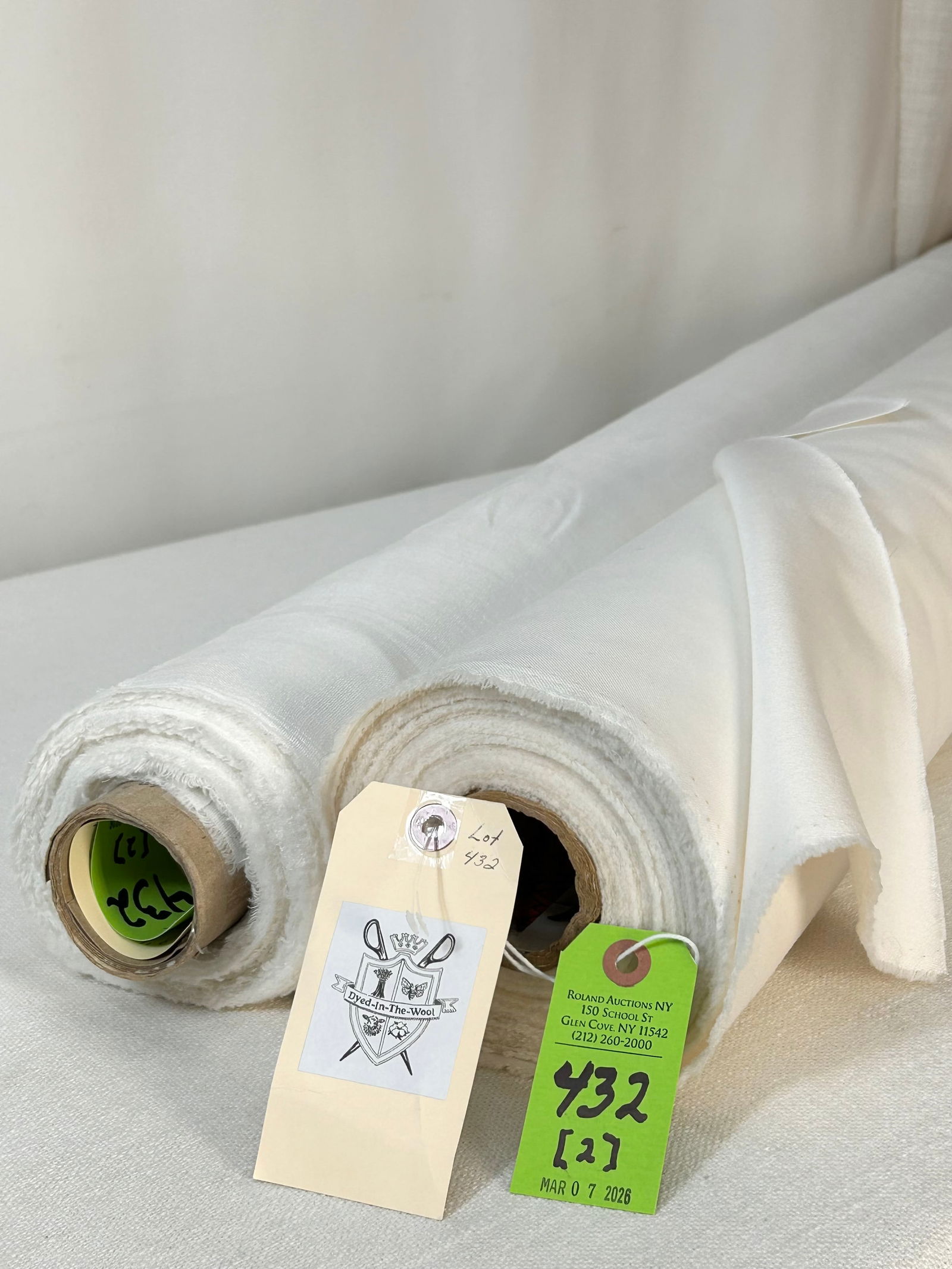 Coraggio's Wool Satin & Fret's Ivoty Sheer Fabric: 1) 18 1/2 yards of Coraggio's worsted wool ivory warp satin called "Gramercy Park", 57" width. Multi-purpose and in excellent condition. The fabric drapes beautifully! 2) 8 1/4 yards of Fret's