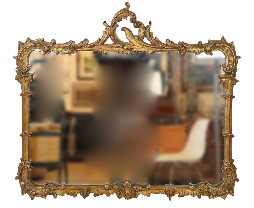 French Carved Mirror: French carved mirror with leaf and horn carving. [33" H x 38" W] . With minor losses.