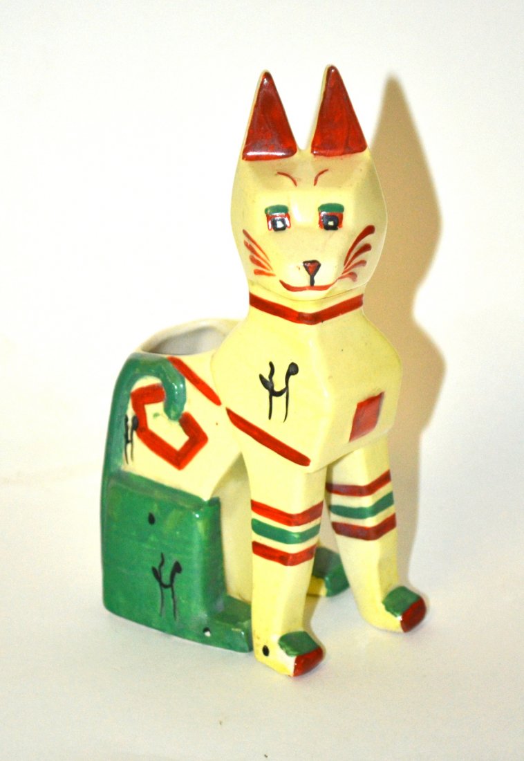Louis Wain Cat: Porcelain cat with a compartment, hand painted, signed: "Louis Wain." Good condition. [6" H]