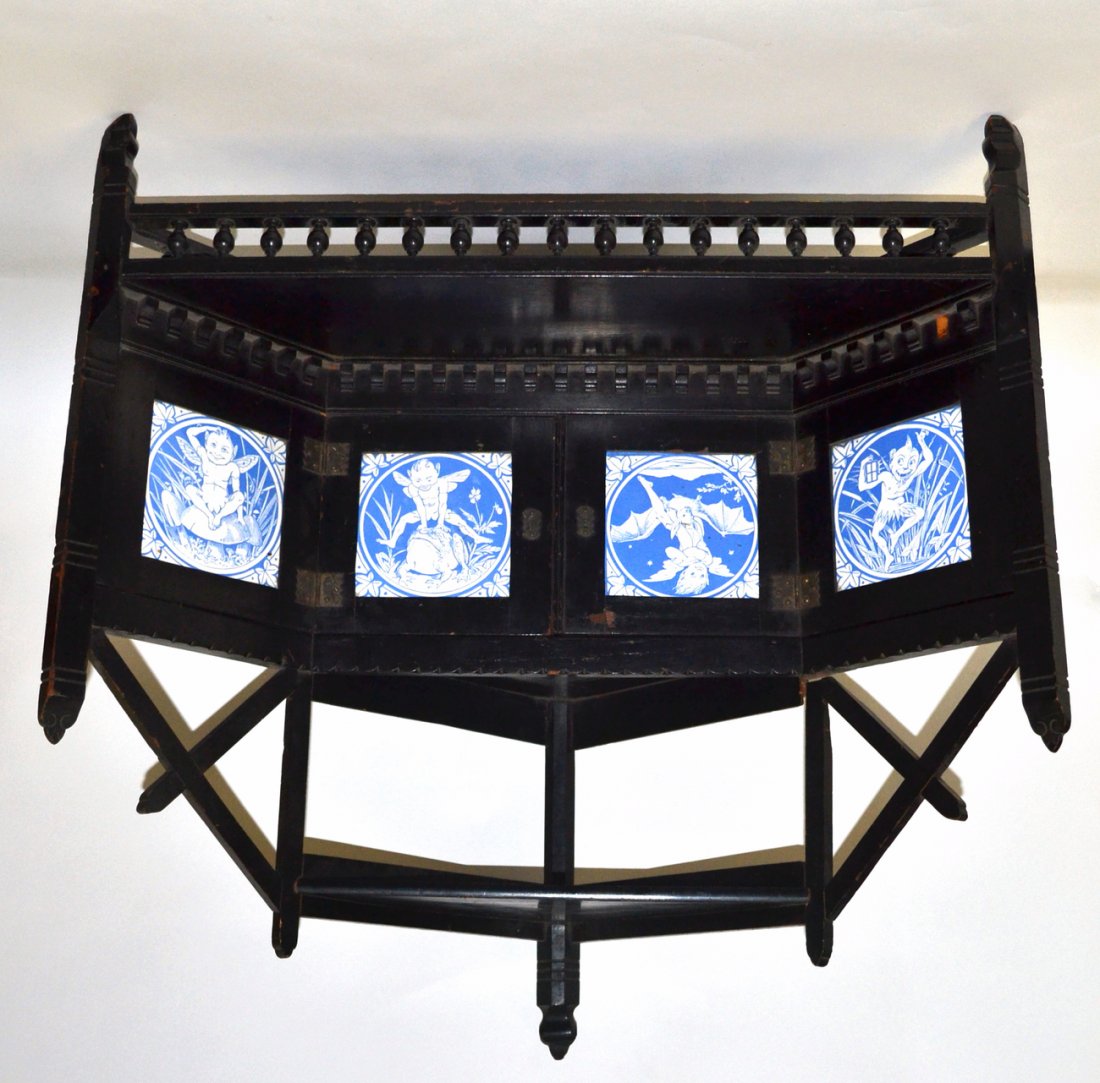 Aesthetic Tile Inset Corner Cabinet: Black 19th century black hanging corner cabinet. Four Minton fairy tale design tiles, Spindle Gallery.
