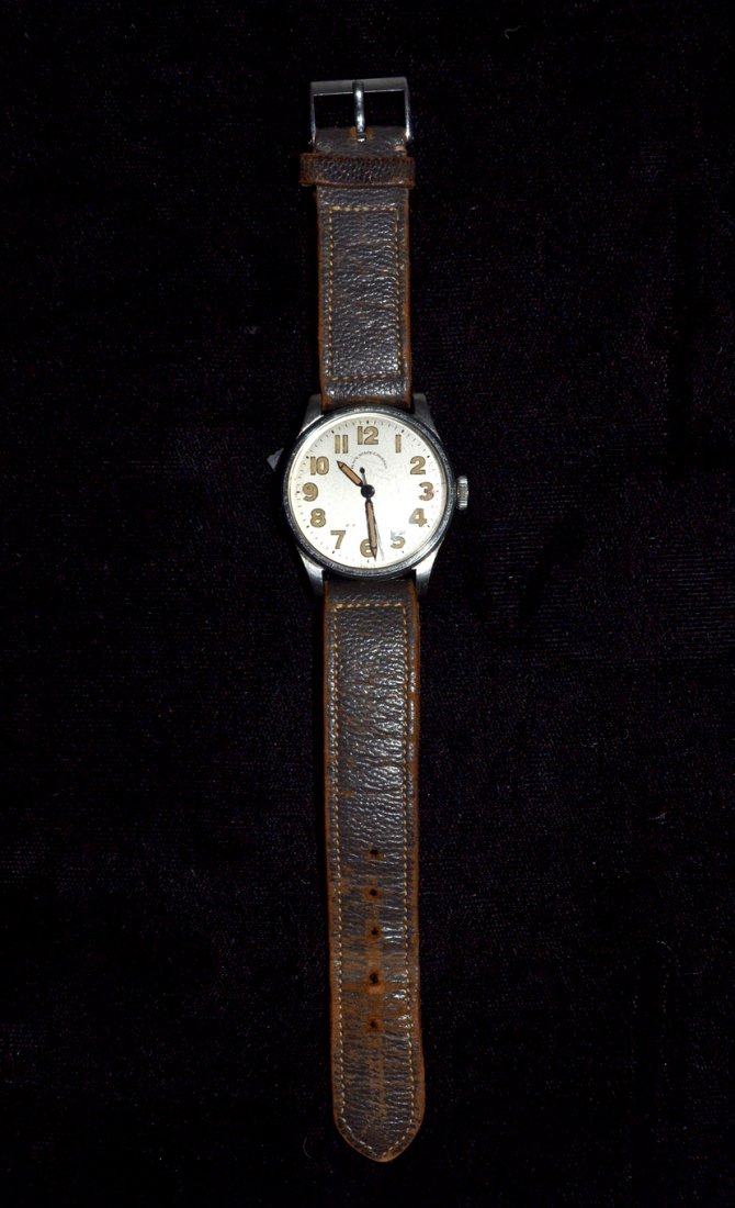 Stainless Steel Men's Strap Watch: Features a circular white dial with black Arabic letters and a sweep second hand. Face reads "Black Starr & Gorhan" [31mm Dia.]. Bears 17 Jewel International Watch Co. movement. Outside engraved "M.F.