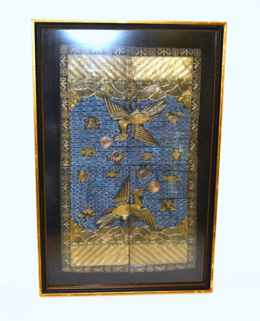 Antique Chinese Gold Thread Embroidered Panel: Rectangular panel with two stylized birds against a blue pattern background. Textile 20 1/8" x 12". Frame 24 1/4" x 16". Textile worn with some separations.