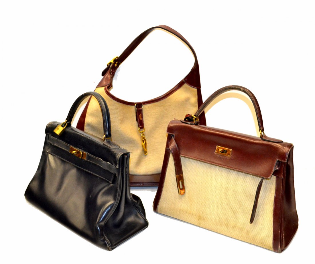 Three Hermès Handbags: All having considerable wear.