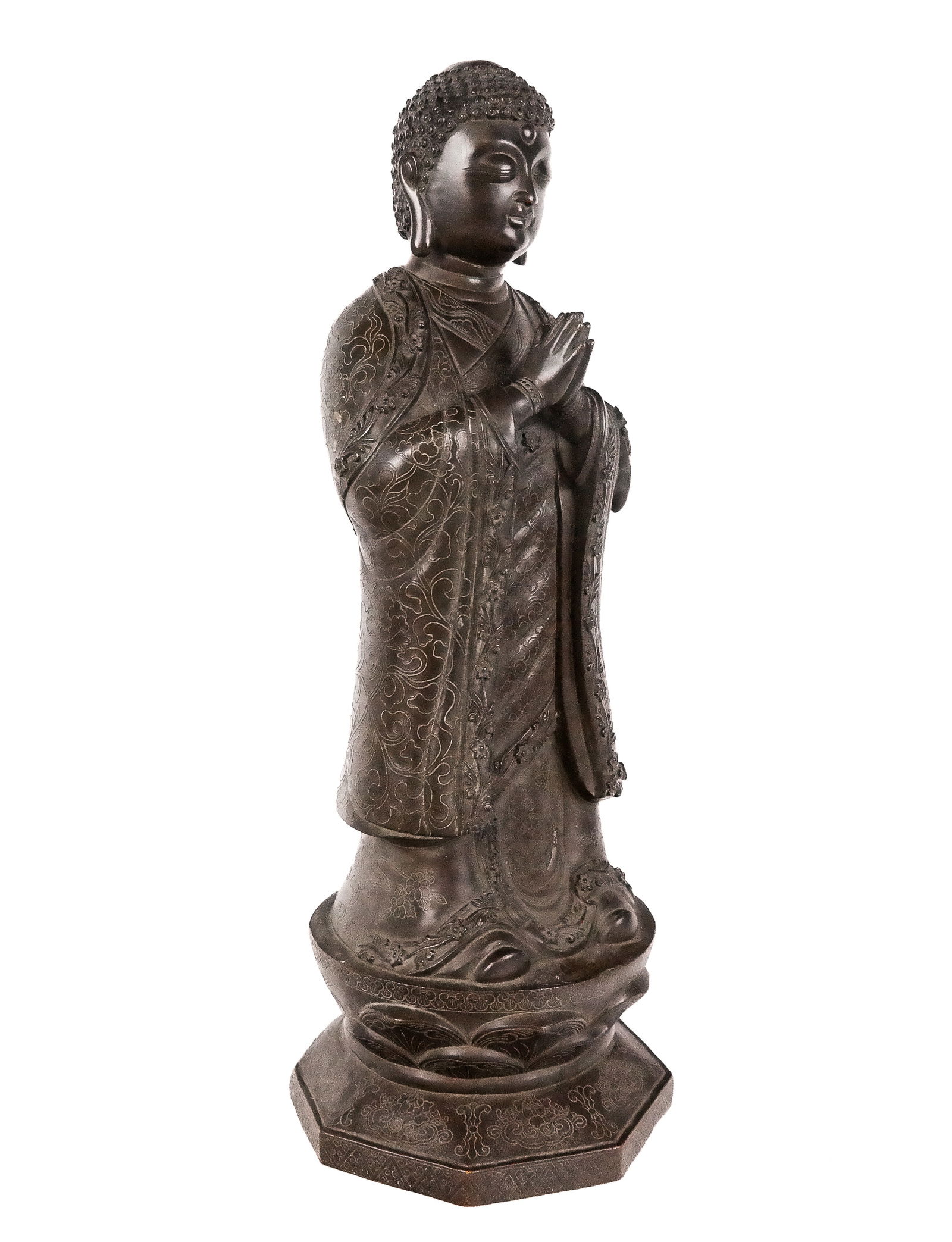 Qing Dynasty Bronze Buddha: Chinese Qing Dynasty patinated bronze of Buddha, 19th century, in anjali mudra, atop a lotus base with octagonal foot, and with etched floral decoration throughout, and with apocryphal Ming Dynasty