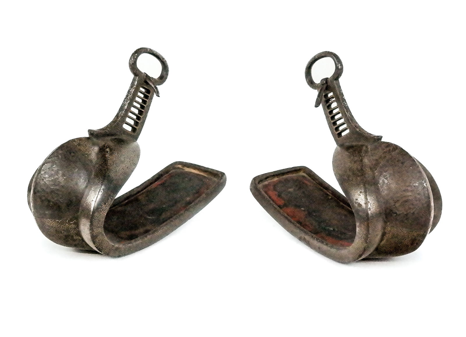 Antique Japanese Samurai Abumi / Stirrups: Pair of Japanese samurai abumi / stirrups, late Edo-Meiji period, 19th century, made of iron with kiri blossom gilt inlays with character marks, with interiors of lacquered wood. [10" H x 11.5" W].