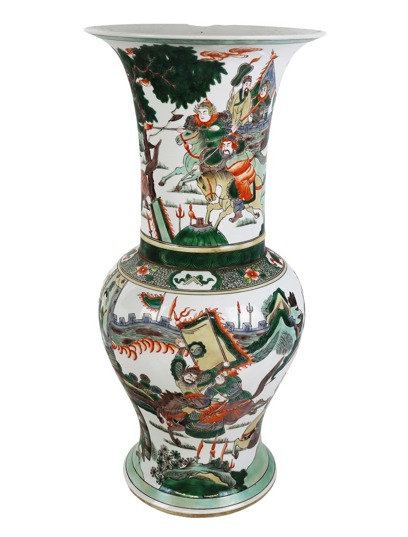 Chinese Famille Verte Vase: Chinese famille verte vase, with a large flared top and wide middle tapering to a base that has all over green and orange enamel paint with galloping warriors above warriors and sages. [19" H x 9" Dia