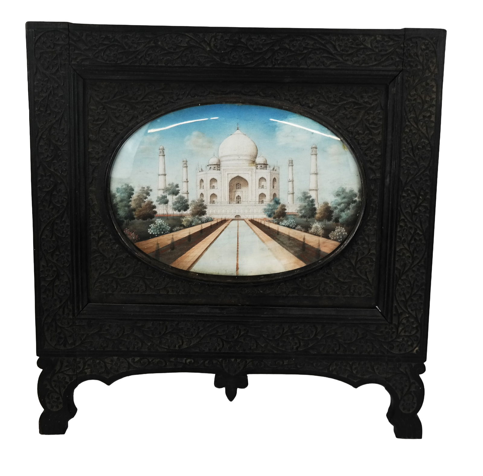 Indian Painting of the Taj Mahal: Indian painting of the Taj Mahal, the oval painting of very high detail, in highly detail carved frame, the painting under glass, 19th century. [Art: 5.5" H x 8" W, Frame: 13" H x 12.5" W]. Slight dis