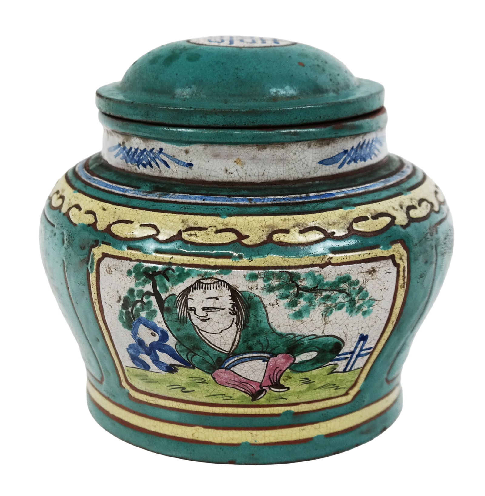 Chinese Antique Yixing Pottery Covered Tea Jar: Chinese Antique Yixing Pottery Covered Tea Jar, All over colorful glazed and enameled colors, Panel front showing a reclining figure, inside cover with stamp. [5.5"H x 6" diameter]. Small chips to sur