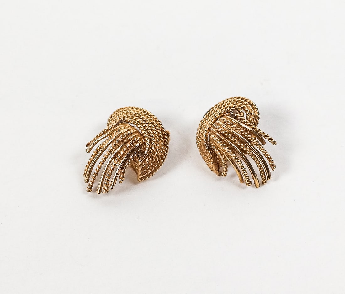 Pair of Gold Rope Twist Earrings: Pair of 14K gold rope twist earrings, marked 14K. [Total 7.25 dwt., 1" Length]. Overall condition is good, sold evident near earring back modification.