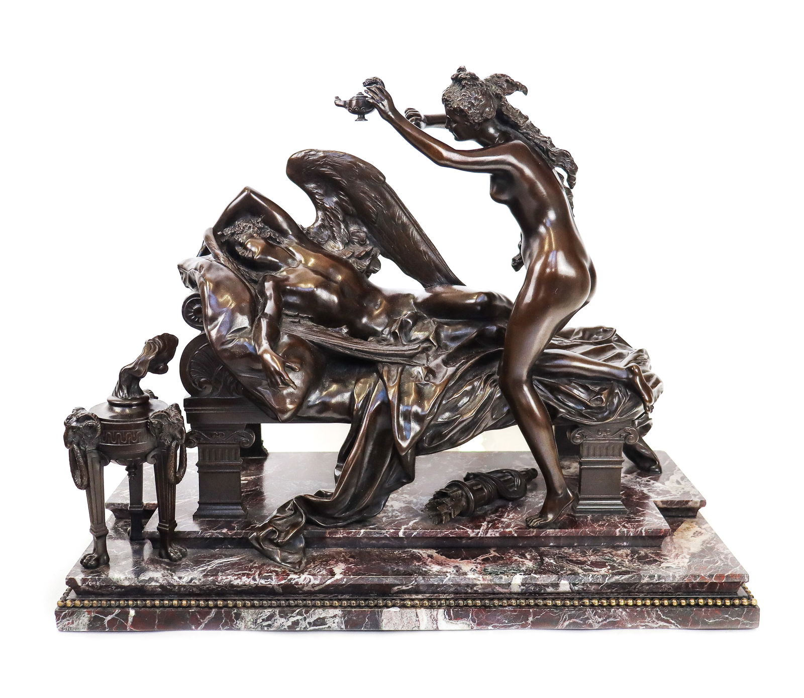 Albert-Ernest CARRIER-BELLEUSE "Cupidon et Psyché": Albert-Ernest Carrier-Belleuse (French, 1824-1887) patinated bronze sculpture of Cupid awakened by Psyche, signed in casting "Carrier-Belleuse," raised on red marble base. [Overall with base: 18" H x