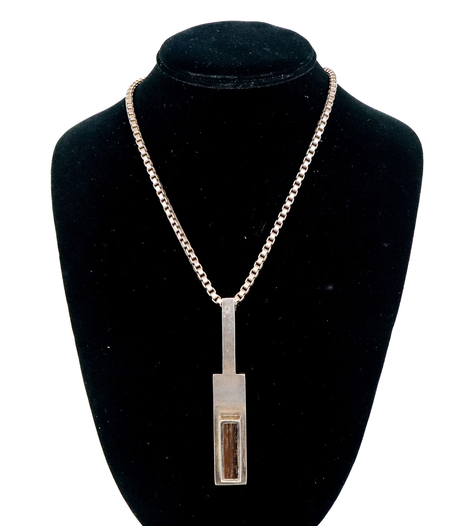 Tiffany & Co. Sterling Chain & Modernist Pendant: Tiffany & Co. sterling silver box link neck chain suspending a modernist silver and wood pendant, marked on the chain with tag "Tiffany & Co. 925" and signed on the claw clasp 925. [Total 2.5 ozt.,