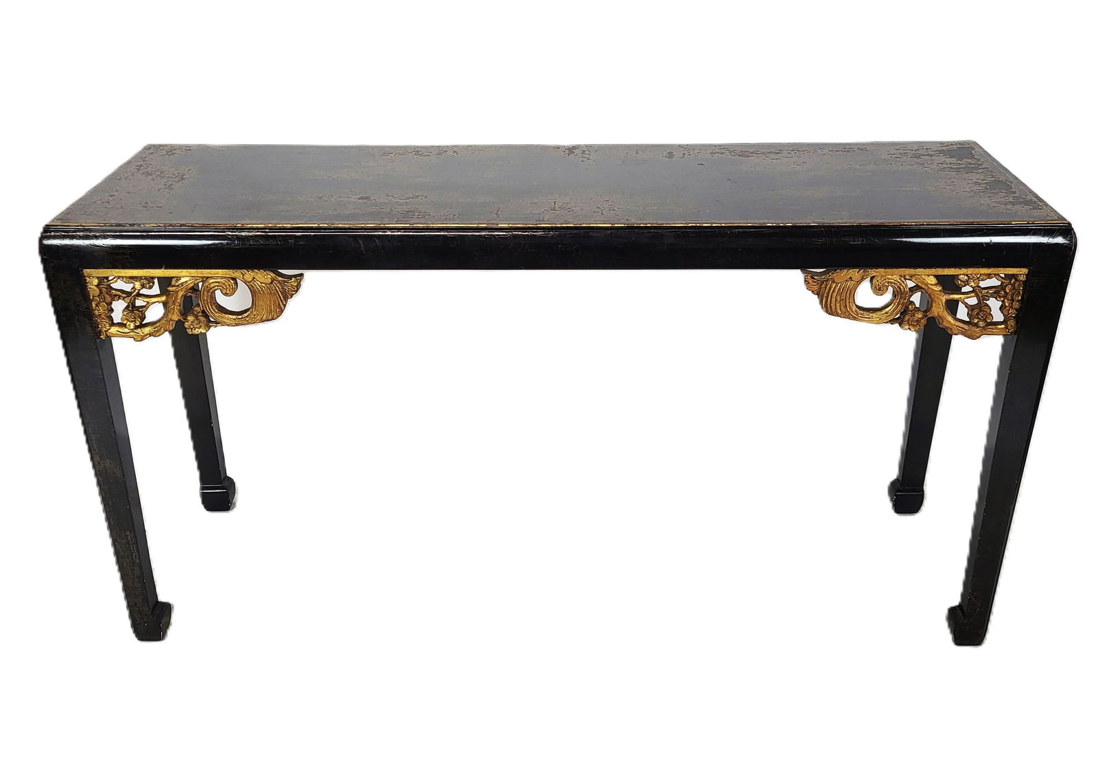 Chinese Long Lacquered Console: Chinese long black lacquered console, with gilt line and trim, and gilt carved mounted under-corners. Early 20th century. [33" H x 63" L x 20" D]. Black lacquer is peeling throughout.
