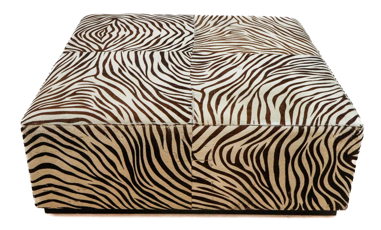 Palatial Zebra Printed Horse Hair Ottoman: Palatial zebra printed horse hair ottoman, 21st century, with a wood base. [17.5" H x 48" Square]. Condition is good with some fading and fraying to edge.