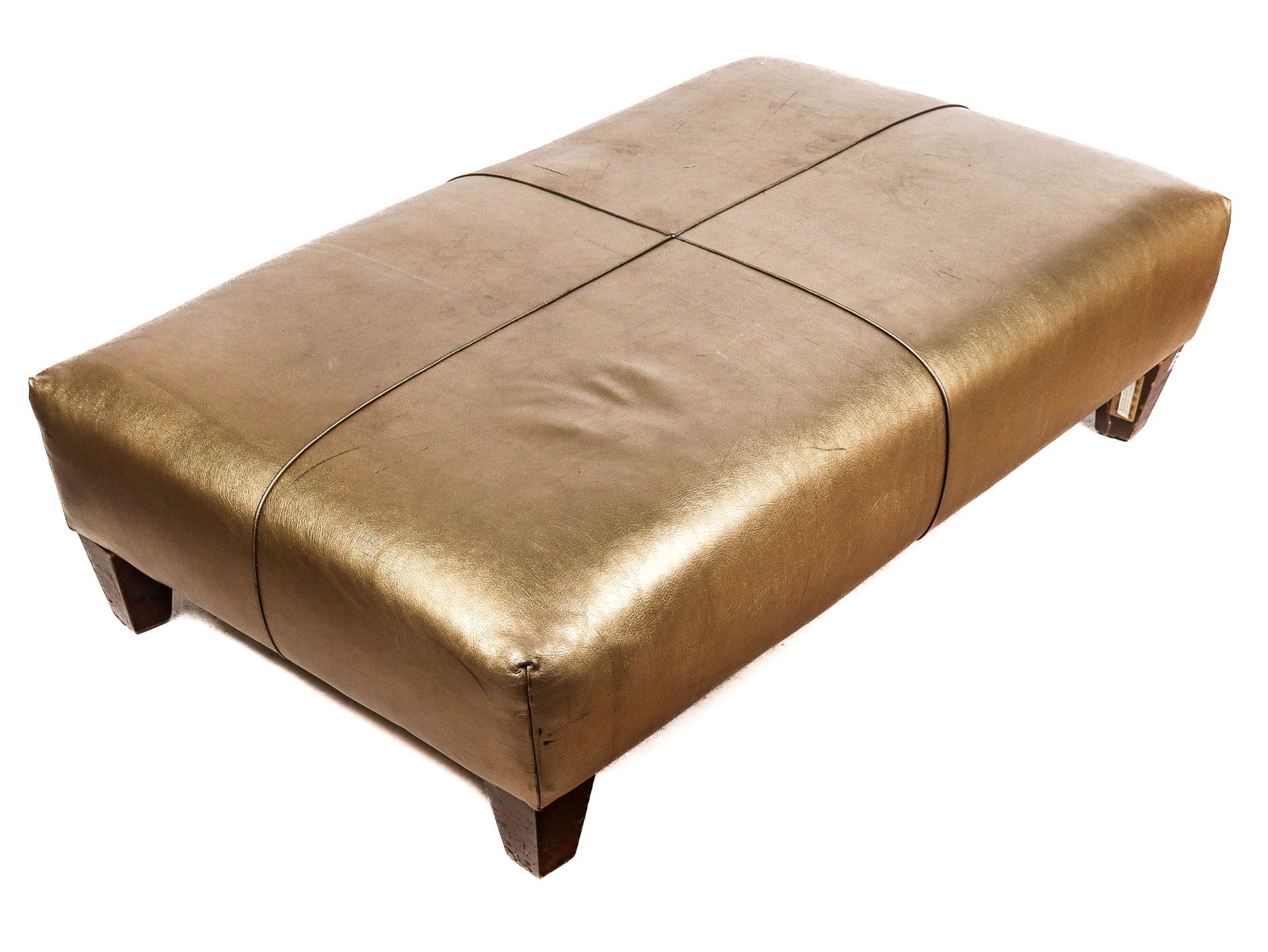 Large Gold Leather Ottoman: Large gold leather ottoman, 21st century, on feet. [16" H x 62" W x 37" D]. Condition is good, some minor fraying to leather at seam.