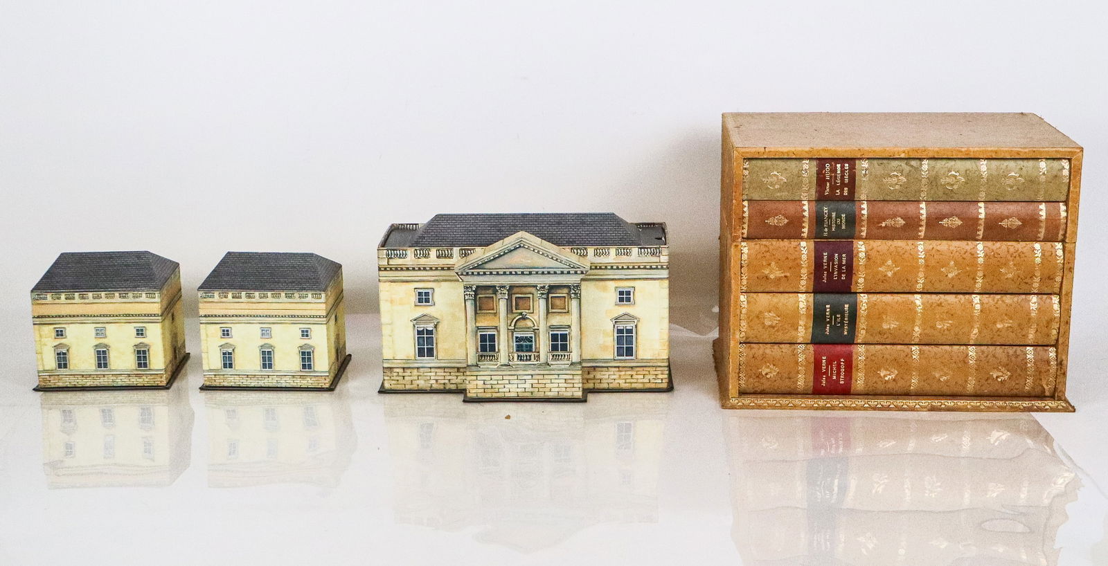 Four Novelty Paper Boxes: Four boxes comprising a book form paper box with lined interior, and three paper boxes from Alan Hutchinson Ltd. "Palladio" series, including a larger stationery box. [Book form box: 11" H x 13.75" W