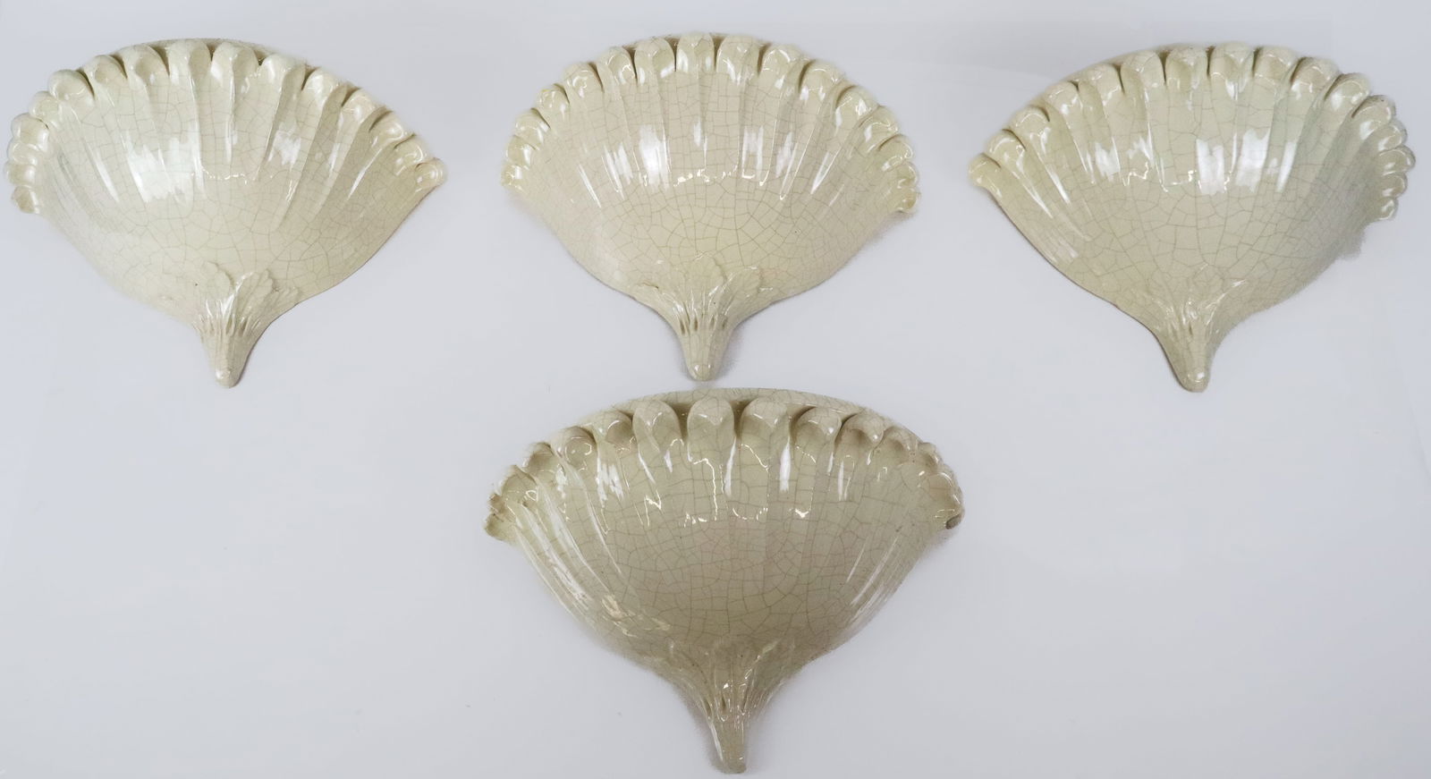 Four Crackle Glazed Porcelain Sconces: Four crackle glazed porcelain scones, 20th century, unmarked. [9" H x 15" W x 7" D]. Condition is good; wiring untested.