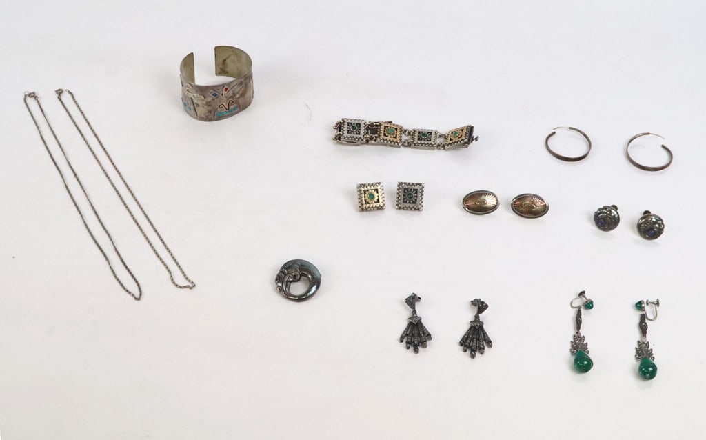 Group of Silver Jewelry, 17: Group of assorted silver jewelry, comprising a green onyx and silver bracelet with earrings, a pair of Howard sterling silver and 14K gold earrings, a Margara silver and enamel cuff, a pair of marcasi