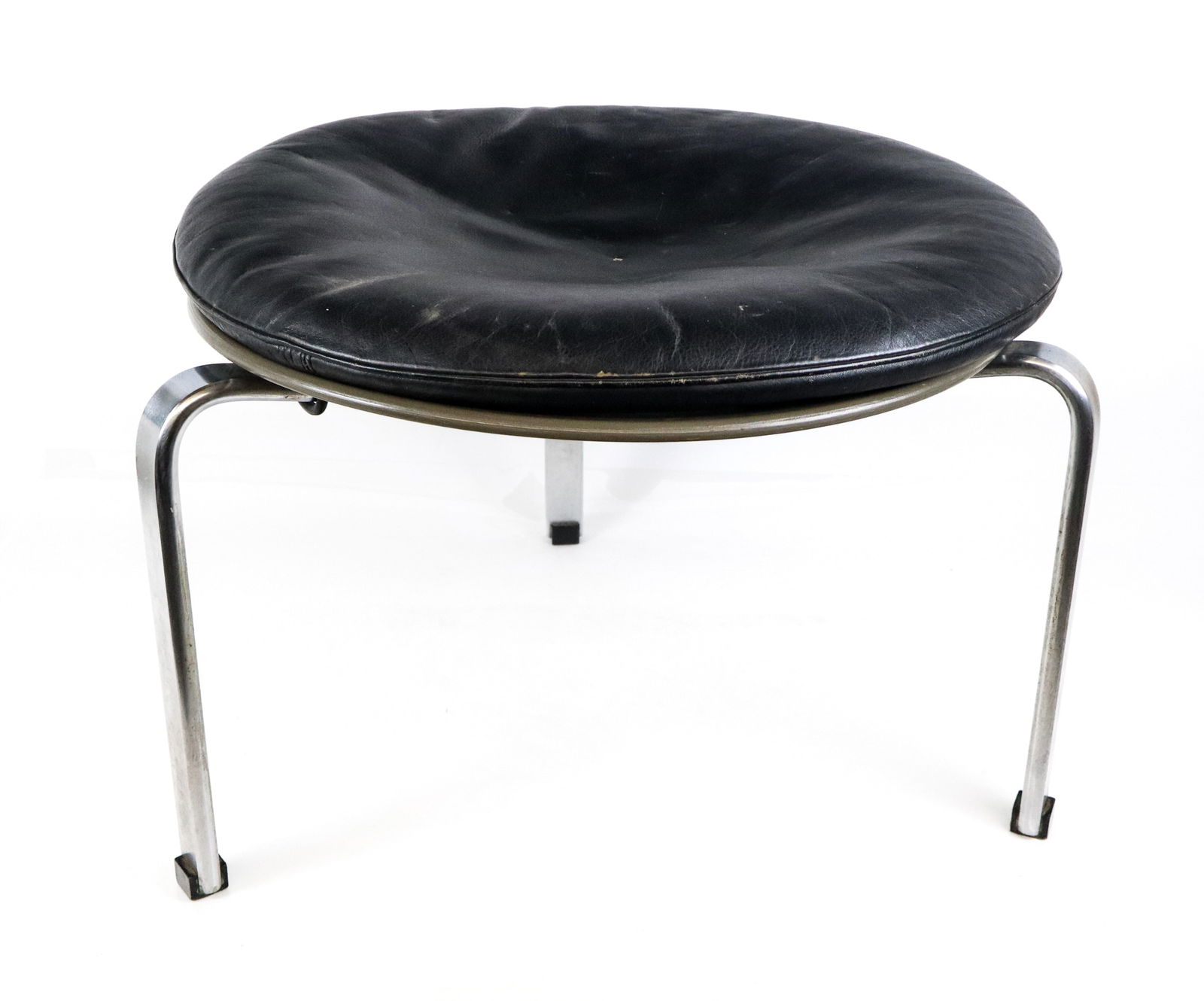 Poul Kjaerholm for Fritz Hansen Leather PK33 Stool: Poul Kjaerholm for Fritz Hansen "PK33" stool, Danish, late 20th century, with a leather top and steel tripod base, unmarked. [21" H x 14" Diameter]. Condition is good with some fading to leather top,