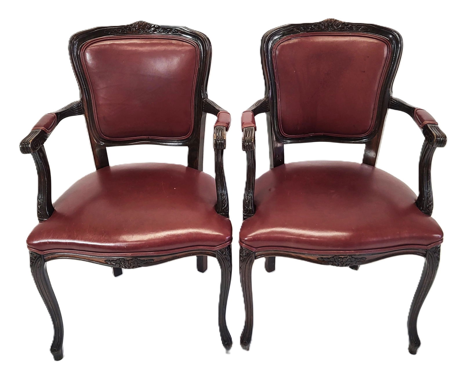 Pair French Fauteuils: Pair French fauteuils, open arm chairs with purple faux leather upholstery and carved frames. Mid-late 20th century. [37" H x 21" W x 23" D]. Good condition.