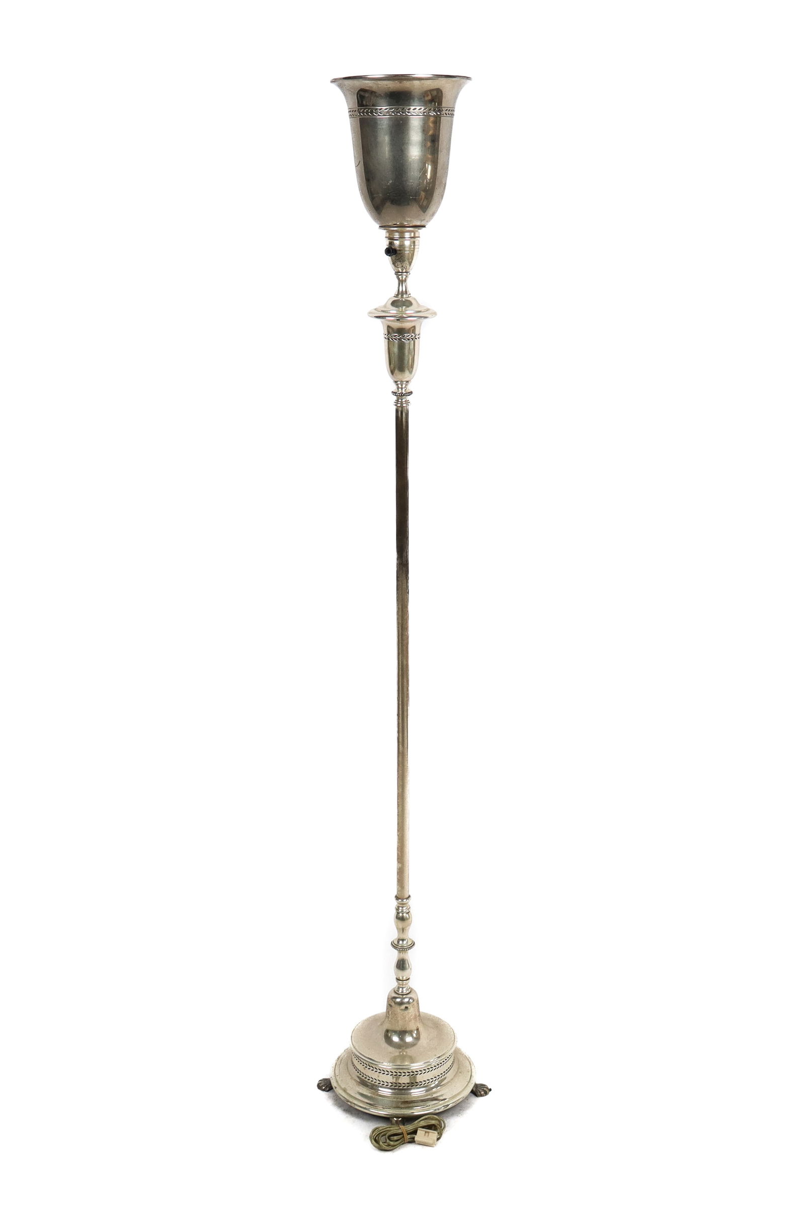 Silverplate Torchiere Floor Lamp: Silver plated torchiere floor lamp, English, 20th century, with reticulated decoration, on shell feet. [60.5" H x 12" Diameter]. Condition is good with some patina and wear to silver plate, lamp sligh
