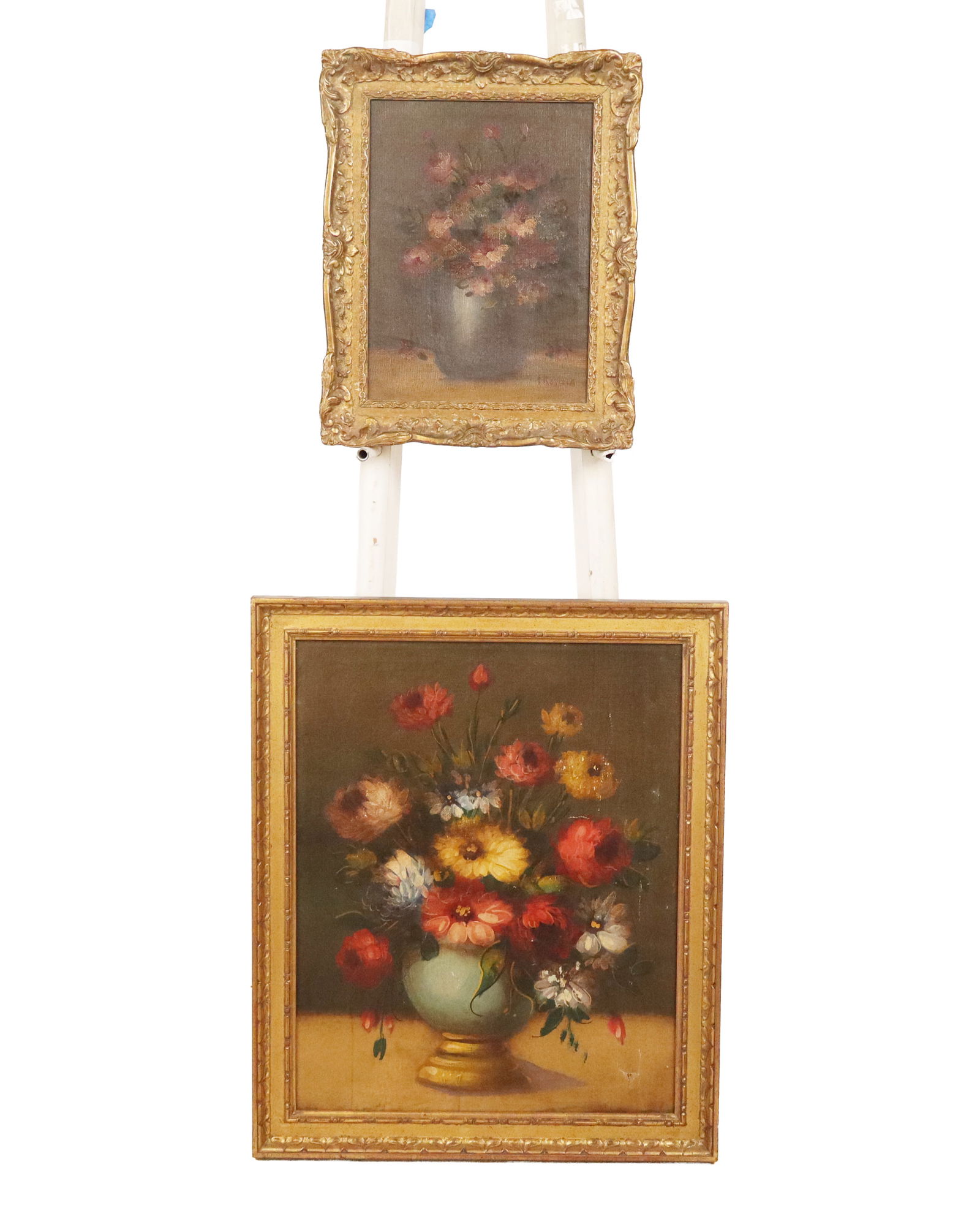 Oil on Canvas Floral Still Lifes, Two: Two oil on canvas floral still lifes, 19th century, comprising a smaller signed work in a gilt frame, signed illegibly, and an unsigned work in a gilt frame. [Larger: 23" H x 19" W]. Condition is fair