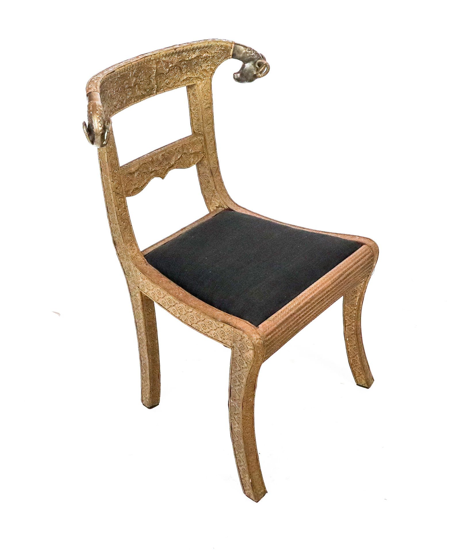 Anglo-Indian Pressed Brass Regency Wedding Chair: Anglo-Indian pressed brass Regency wedding chair, 19th Century, with foliate and floral decorated pressed brass to sides and pressed rope-twist detail to seat front, and with a ram's head to each side