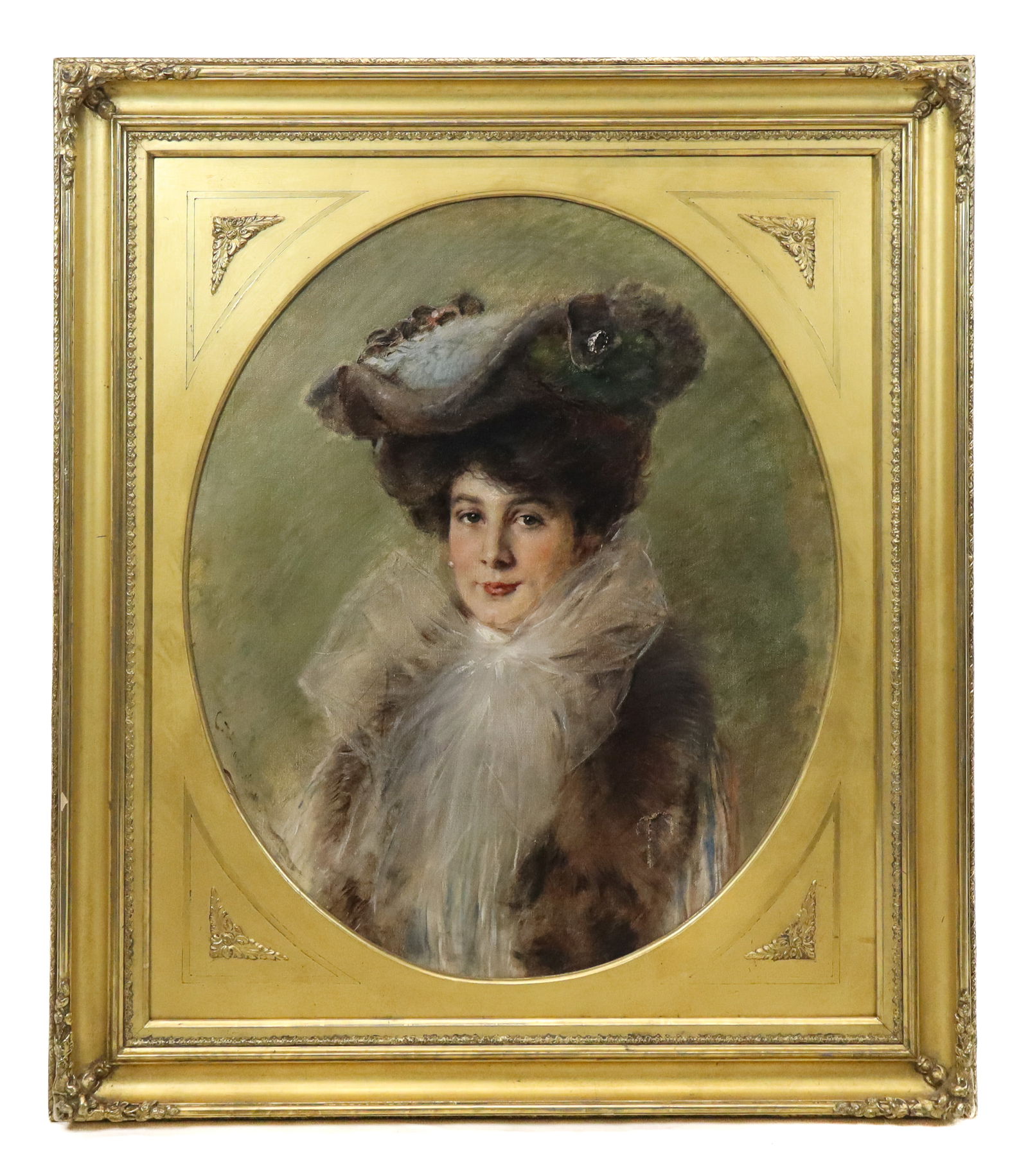 Signed Oval Portrait Oil on Canvas: Signed oval portrait oil on canvas of a Victorian woman with large hat, lace collar over a fur wrap, oval canvas in rectangular frame. Signed along lower left illegible. [Art 29" x 24", frame 39" x 34