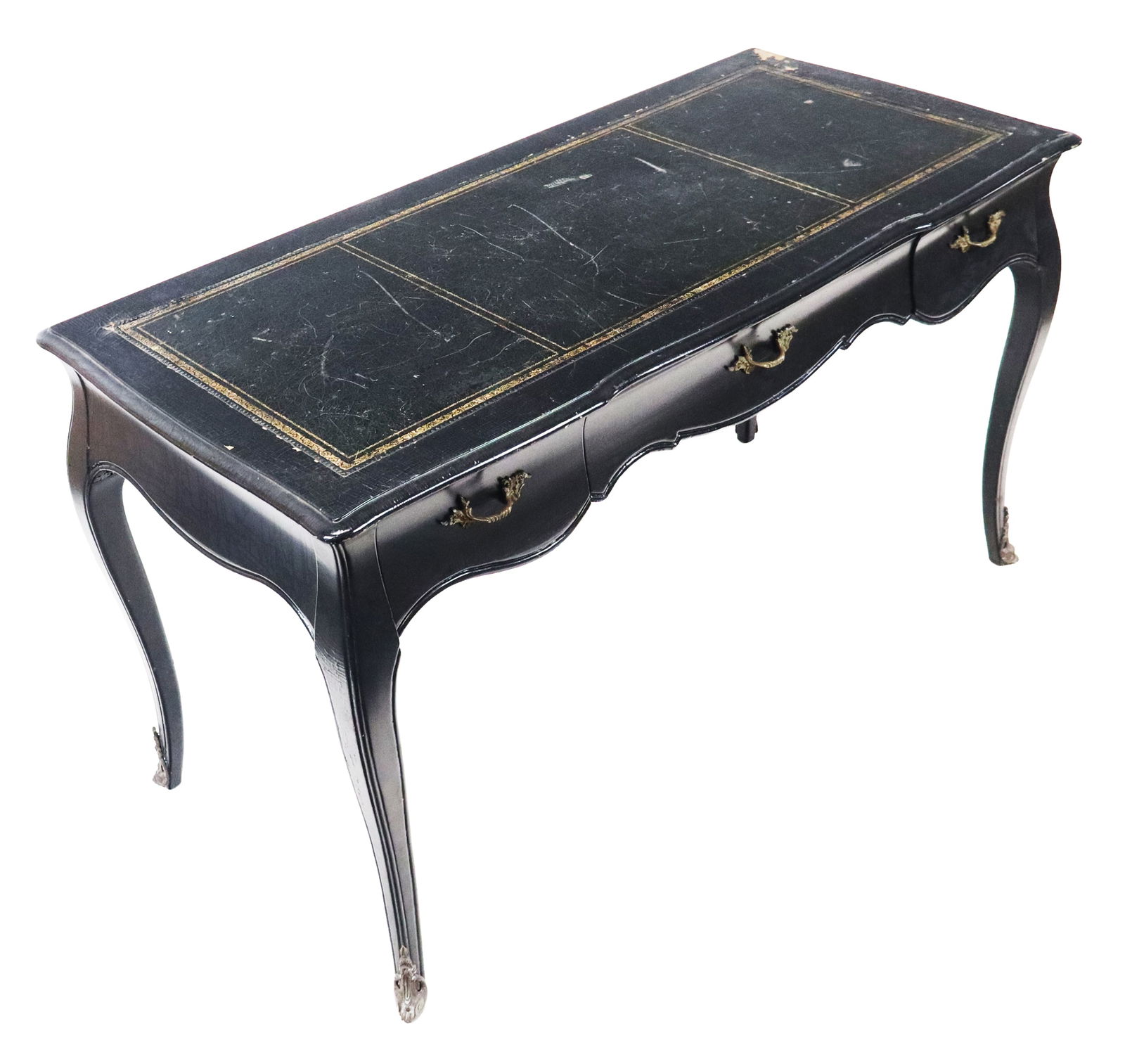 French Black Painted Bureau plat: French black painted bureau plat, with three panel tooled leather top, three drawers with carved skirted fronts, metal mounted feet. [29" X 53" X 24"]. Craquelure paint and chips all around.