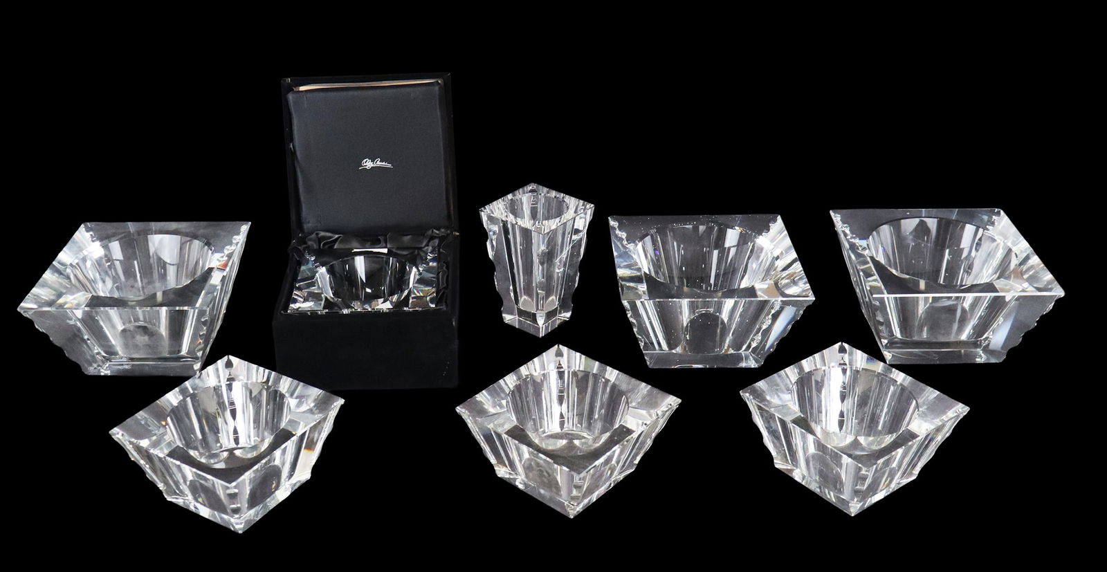 Oleg Cassini Collection of Crystal Vases & Bowls,: Collection of Oleg Cassini crystal tablewares all designed as a rectangular forms with cut crystal corners which graduate from the base to the top, comprising a vase [6" H x 3.75" Square], 4 bowls [3.