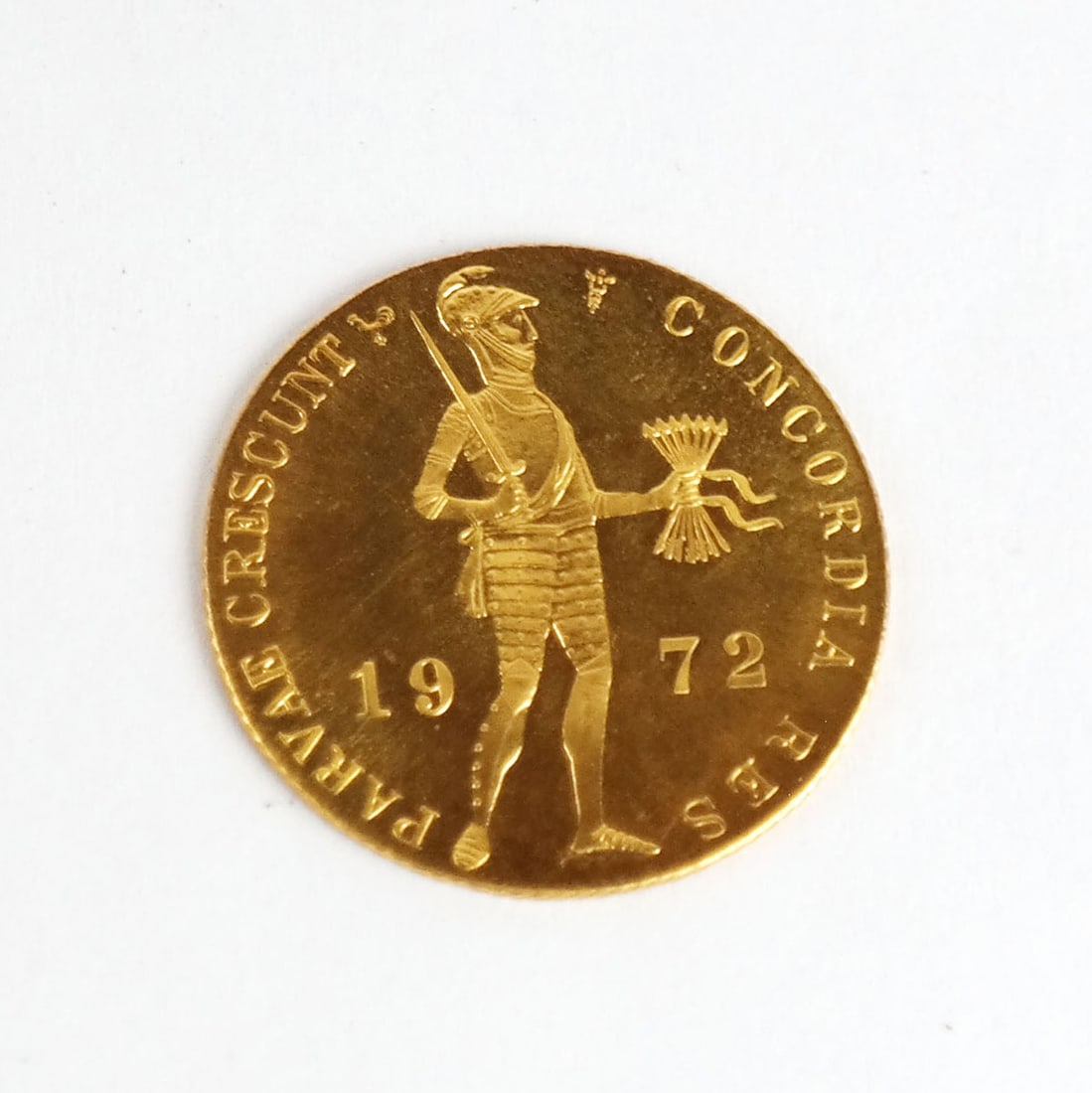 1972 Dutch gold ducat coin: 1972 Dutch gold ducat coin, Parvae Crescunt Concodia, "Juliana". 3.49 grams.