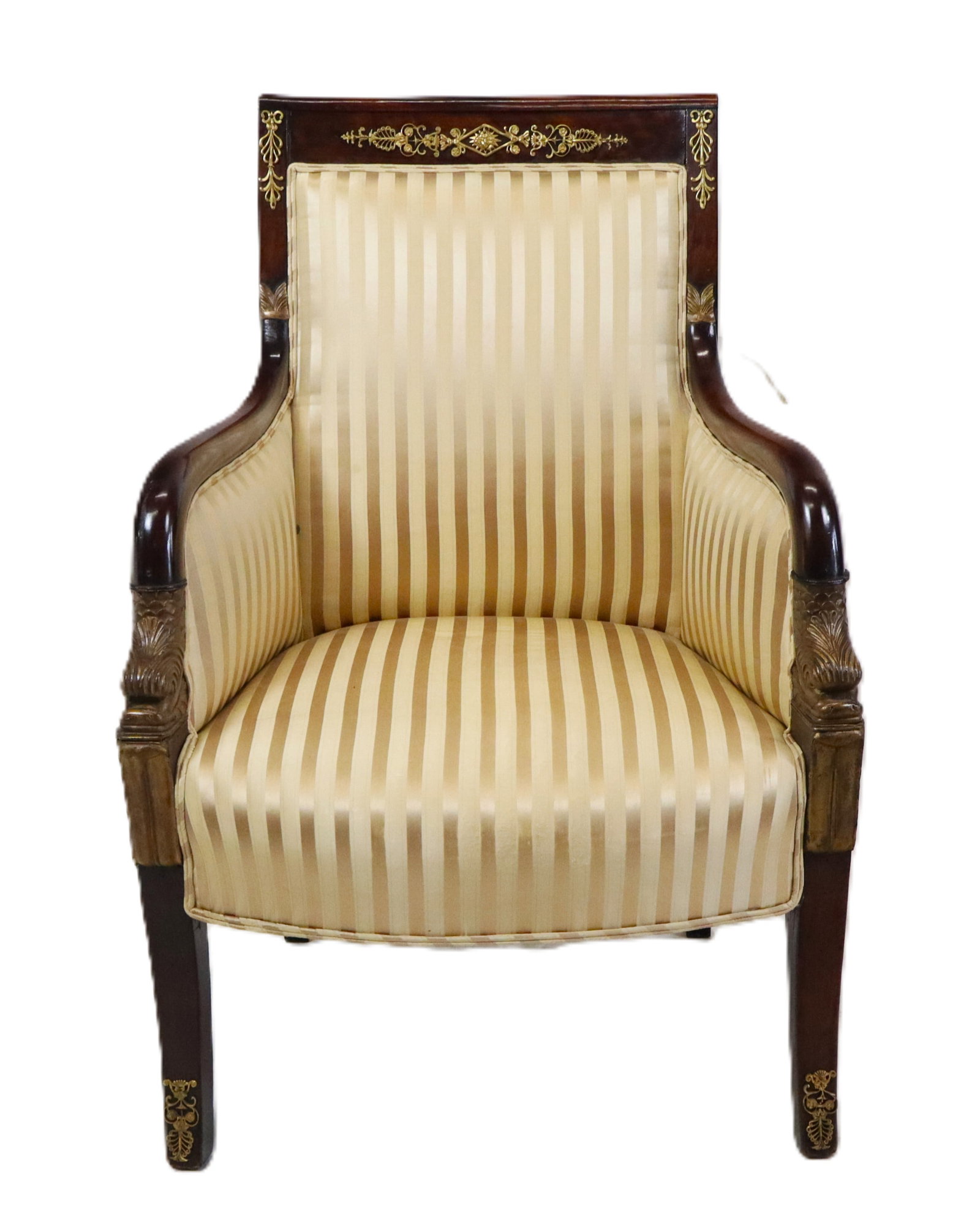Antique French Empire Bergere: Antique French Empire bergere, bronze mounted mahogany straight crest over a striped silk upholstered frame, gilt carved knuckles, bronze mounted splay legs. Early 19th century. [36" H x 25" x 25"]. G