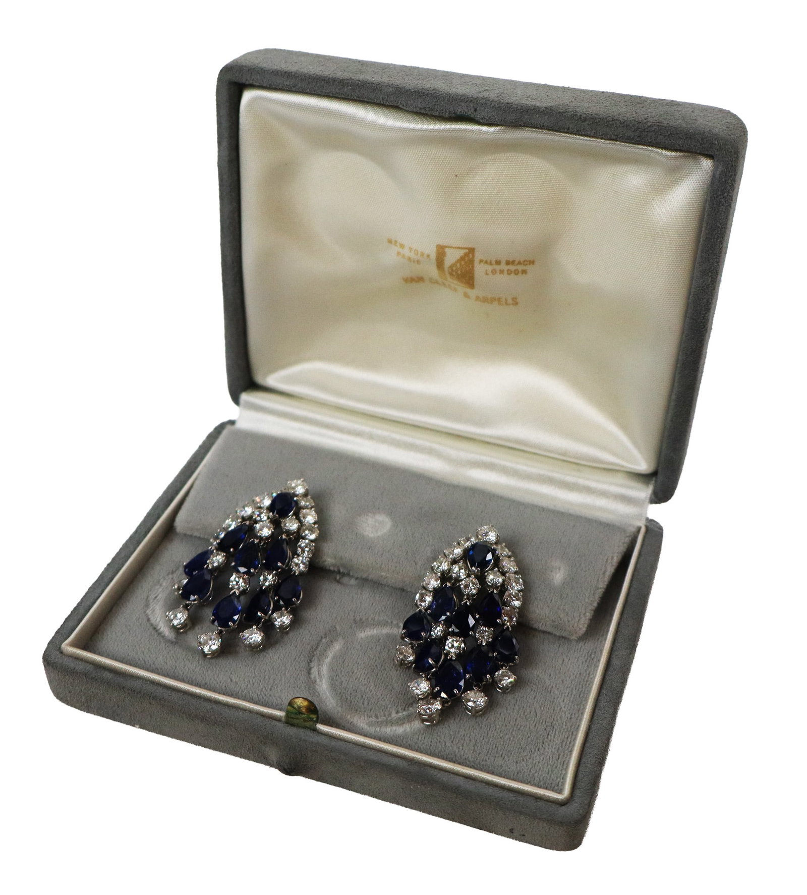 Van Cleef & Arpels Diamond & Sapphire Ear Clips: Van Cleef & Arpels pair of diamond and sapphire ear clips, mounted in platinum, set with 18 pear shaped sapphires, total approximately 9.00 carats, and 44 round brilliant-cut diamonds, total approxima