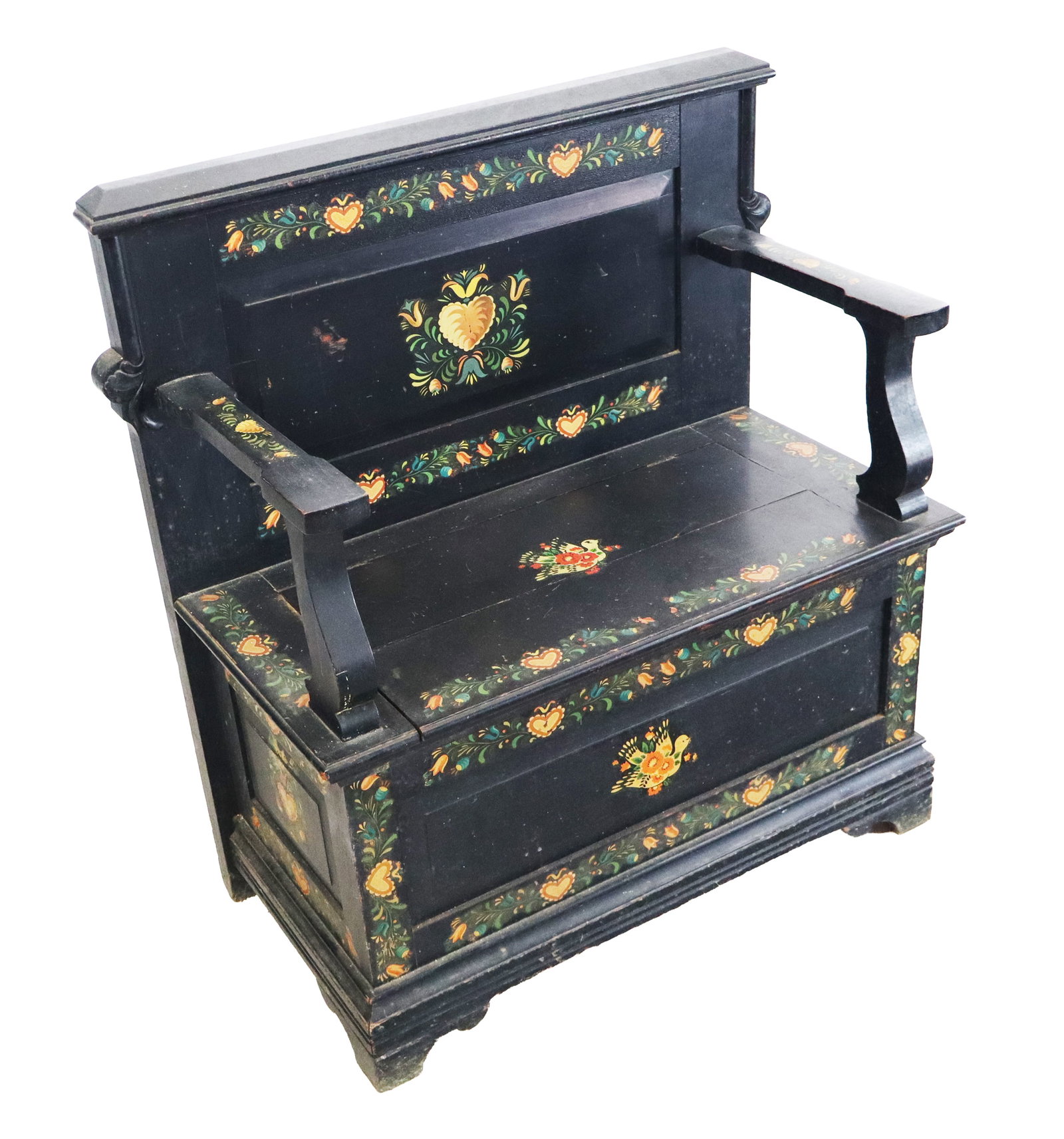 Antique Dutch Colonial Painted Bench / Settle: Antique Dutch Colonial painted bench with delicate painted colorful leaves, flowers, birds, and hearts on a black ground, open arms, and a lift seat. Mid 19th century. [39" H x 37" W x 19" D]. Split t