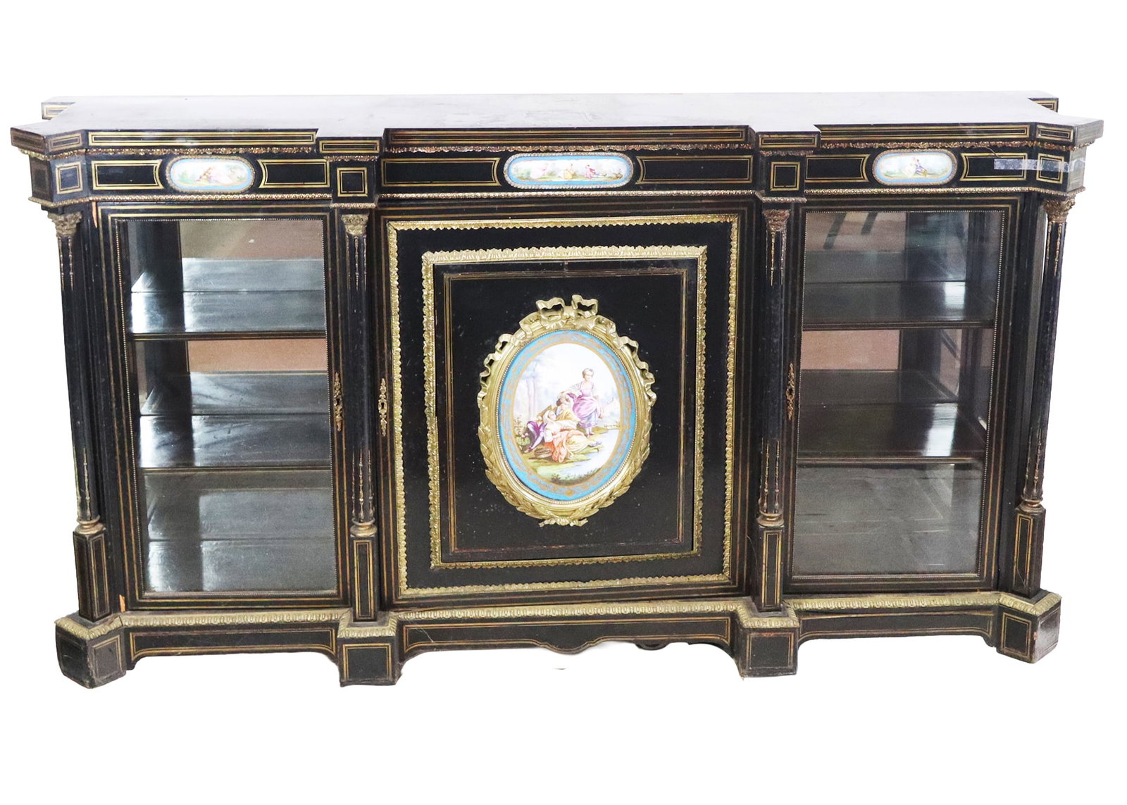 Louis Phillipe Large Credenza: Louis Phillipe Large Credenza, the plain painted top above 3 doors, the center with large bronze mounted severs porcelain oval plaque, the side doors having glass fronts, all around bronze mounts and 