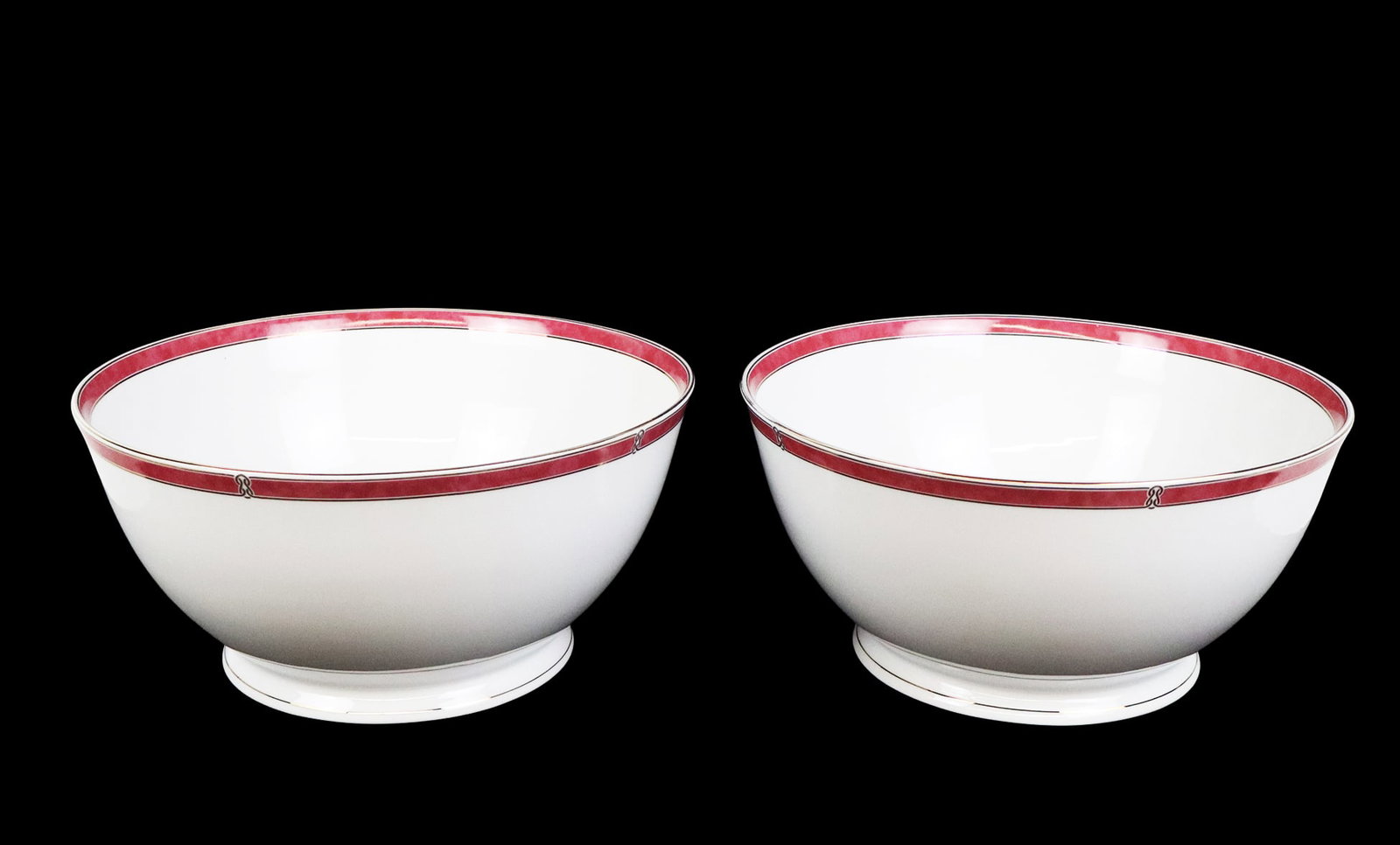 Pair of Christofle "Oceana Rouge" Serving Bowls: Pair of Christofle "Oceana Rouge" serving bowls, circa 20th Century, with hand applied borders, both with marks to bases. [5" H x 10.25" Diameter]. Condition to each is good.