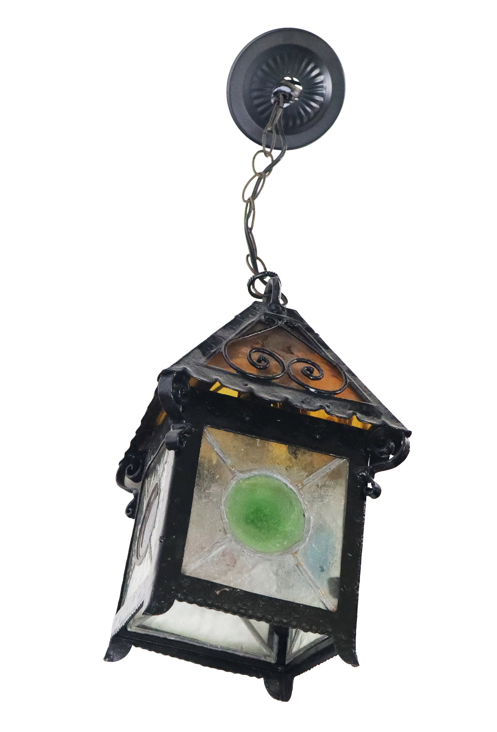 Arts and Crafts Stained Glass Hanging Lantern: Arts and crafts stained glass hanging lantern, later 20th century, with a cast iron frame, textured glass, and colored glass rondels. [Excluding chain: 14.5" H x 7.75" Square; chain: 12" L]. Condition